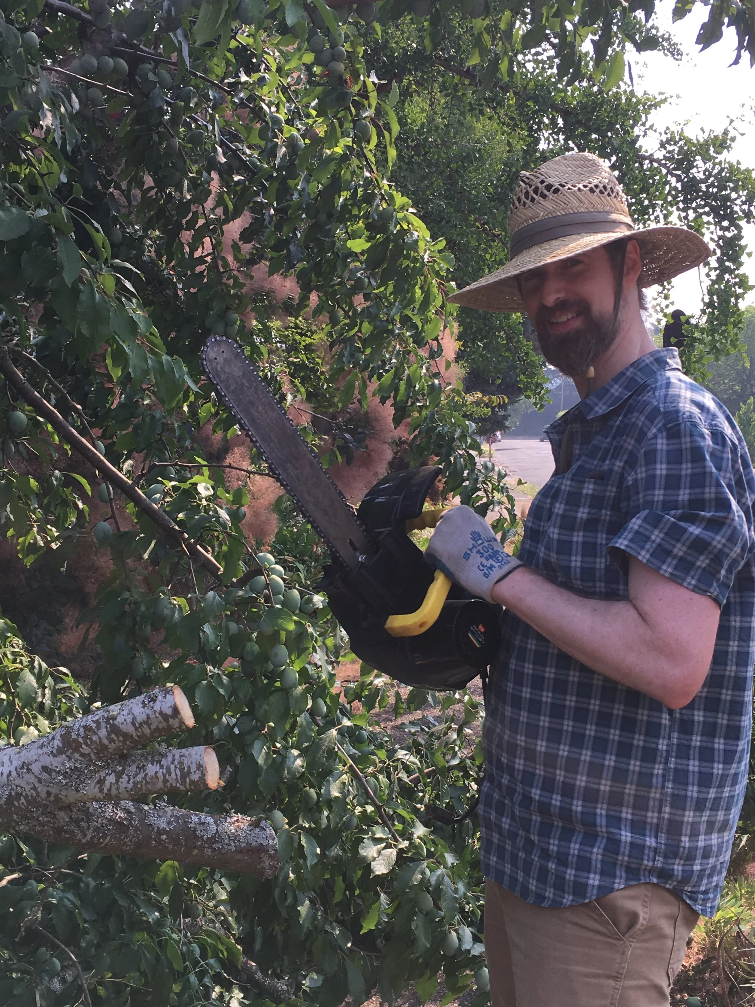 flutist, saxophonist, composer, and dad, John C. Savage, rockin' the chainsaw