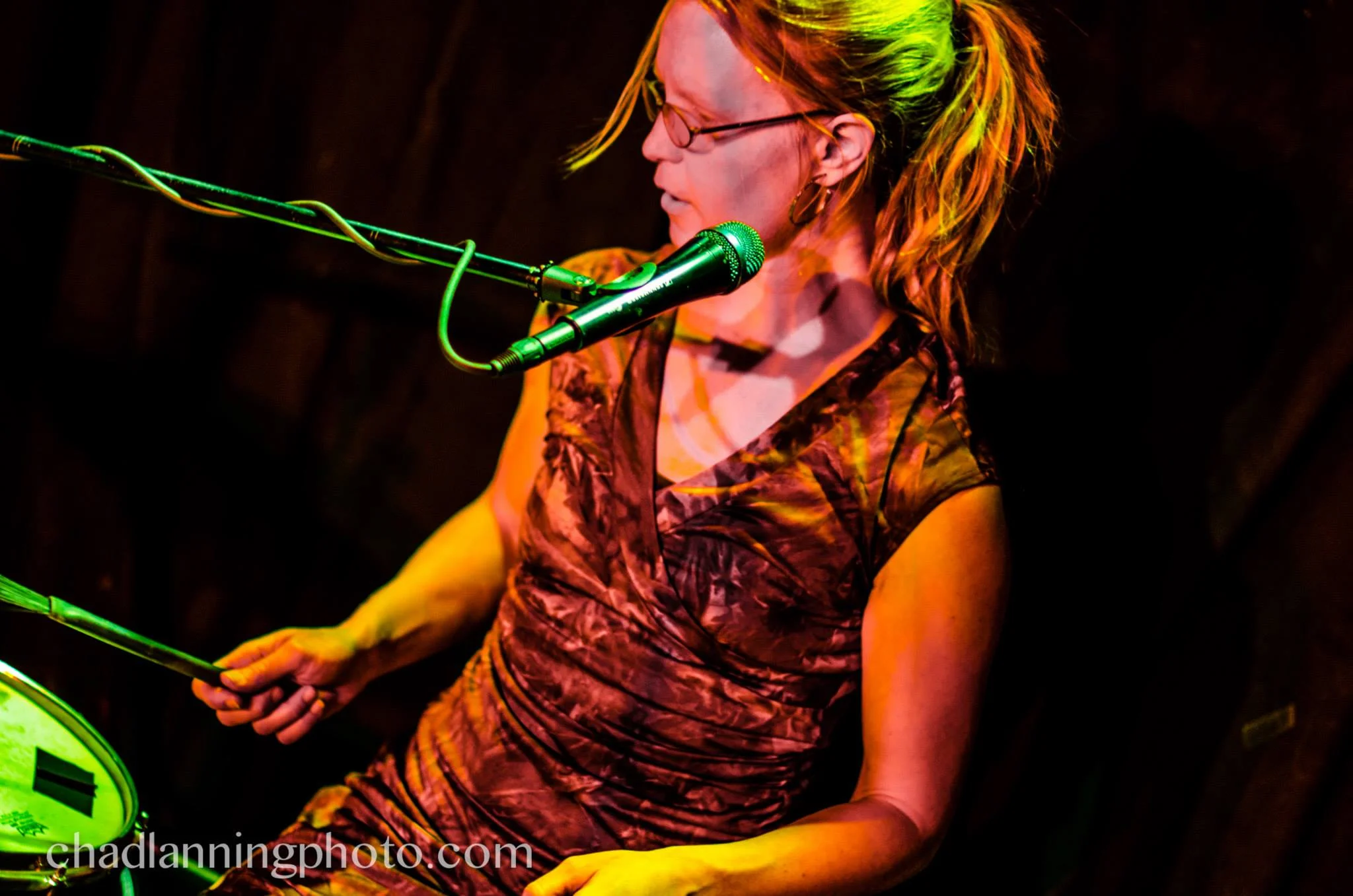 Juniana Lanning playing drum set (photo by Chad Lanning)