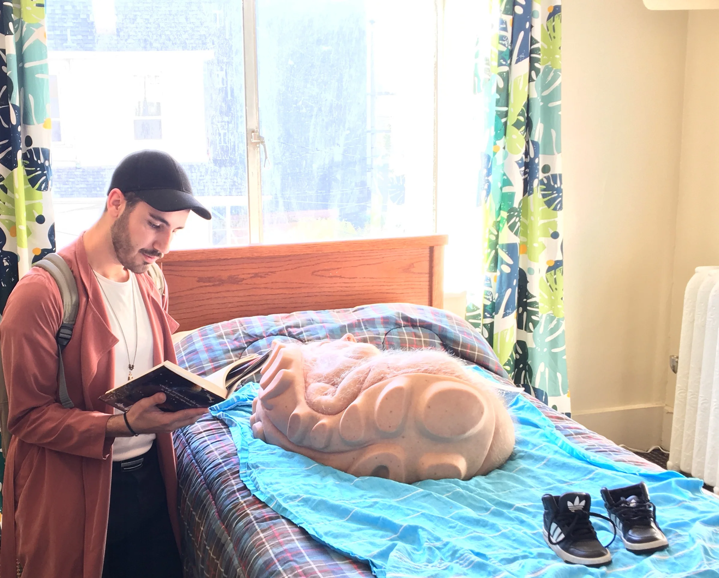 Me reading a bed-time story to one of the creatures at Patricia Piccinini’s show.