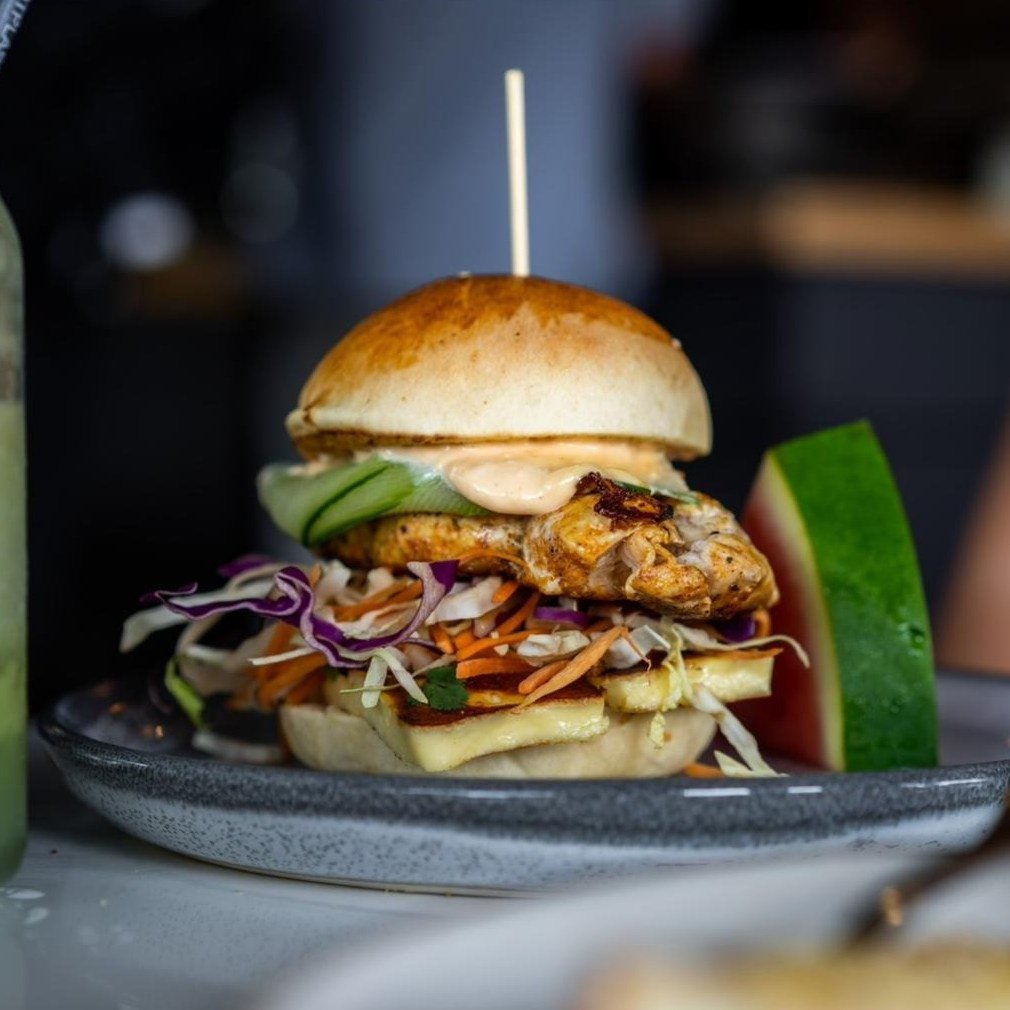 Our chicken burger is a vibe. 🖤

 #CoffeeLovers #goodvibes #soulfood
