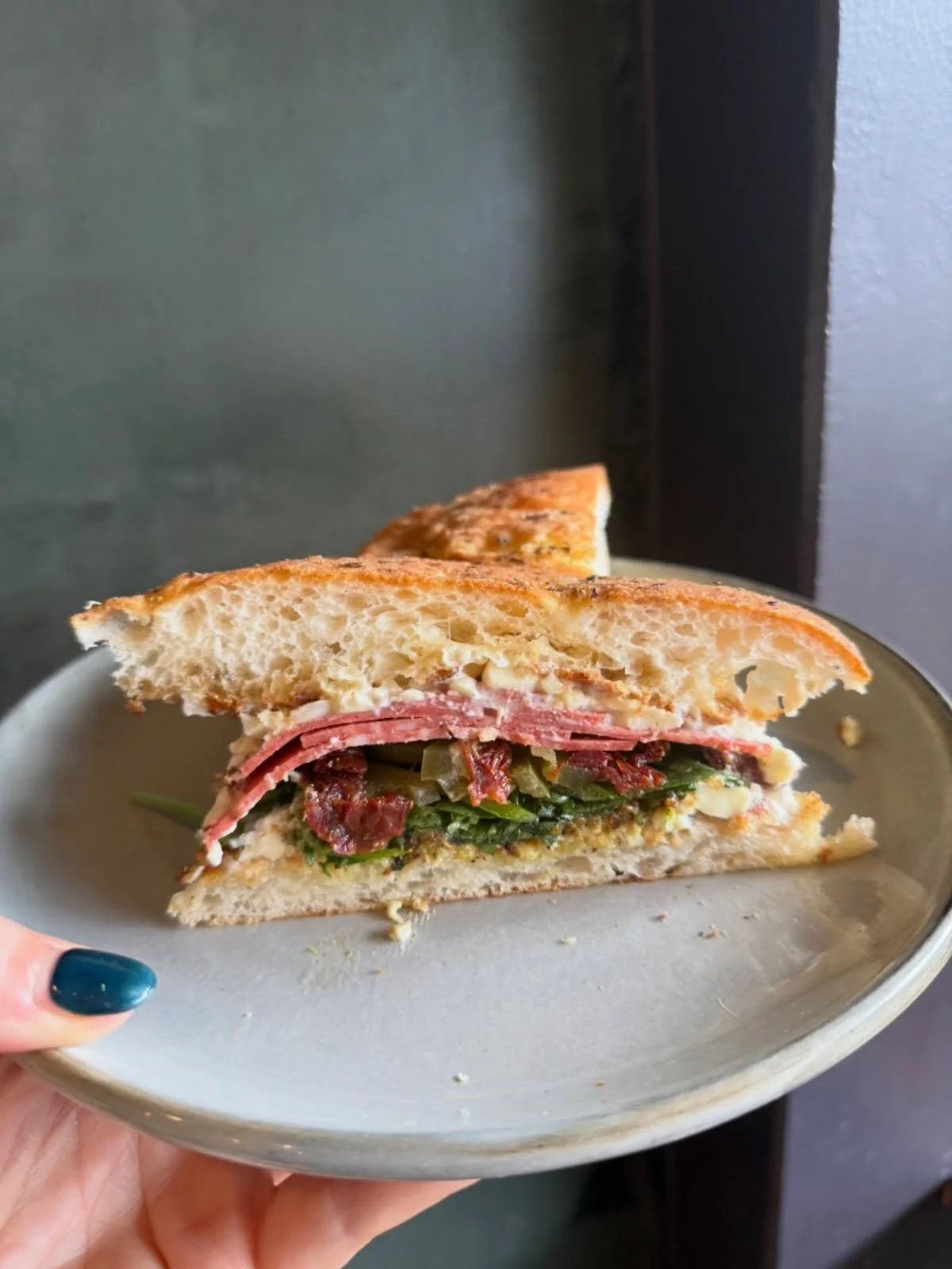 Spicy, creamy, a little bit messy&hellip; just how we like it 🔥 

Today&rsquo;s focaccia is stacked with spicy salami, whipped mozz, sun-dried tomatoes &amp; homemade pistachio pesto&mdash;absolute flavour bomb. 

Catch it while it&rsquo;s on 👀