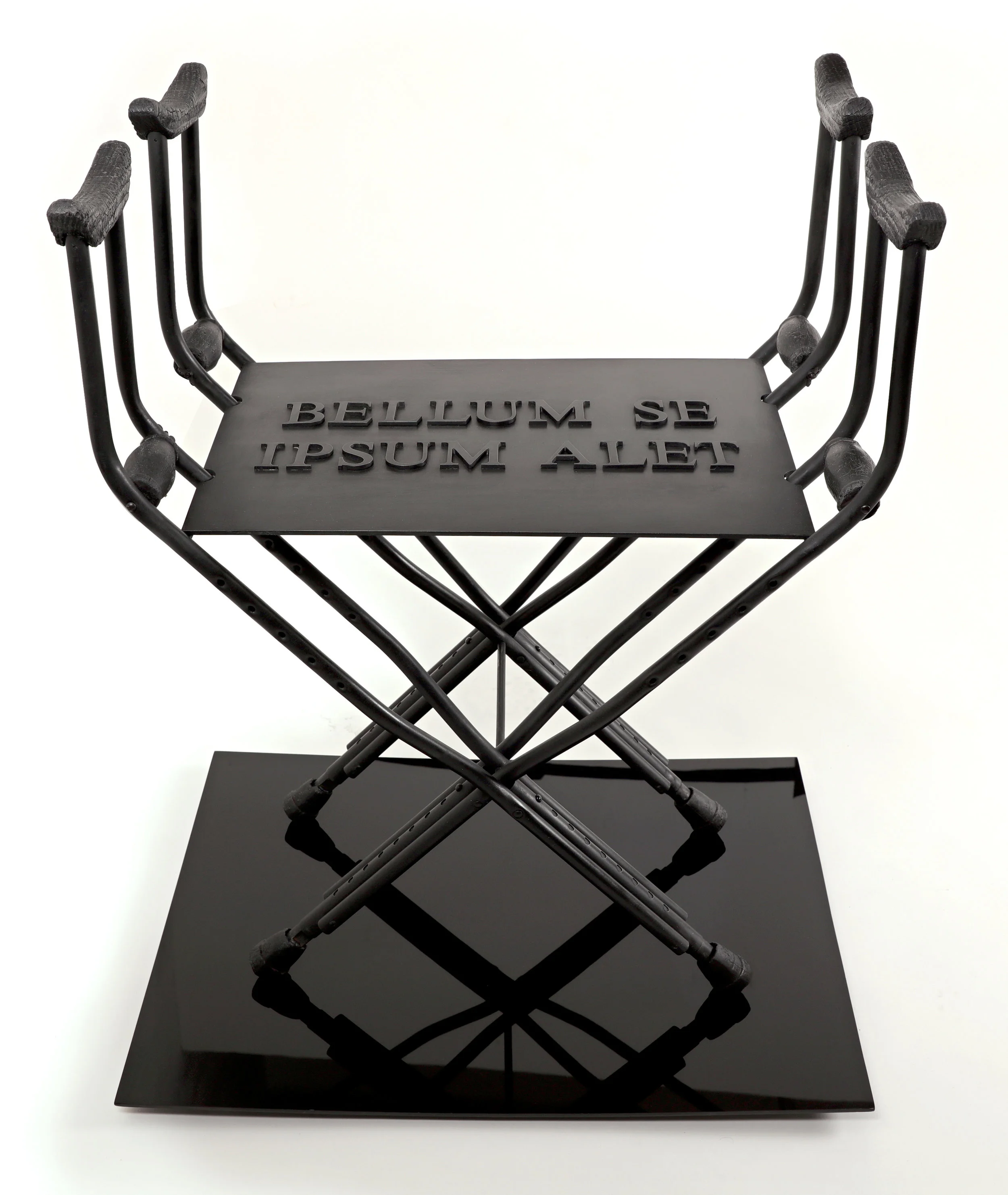 Sella Castrense Revisited , 2016 / Crutches, burned wood, aluminum, patina on black acrylic base / 24 x 31 x 36 inches / Photo: Pedro Portal