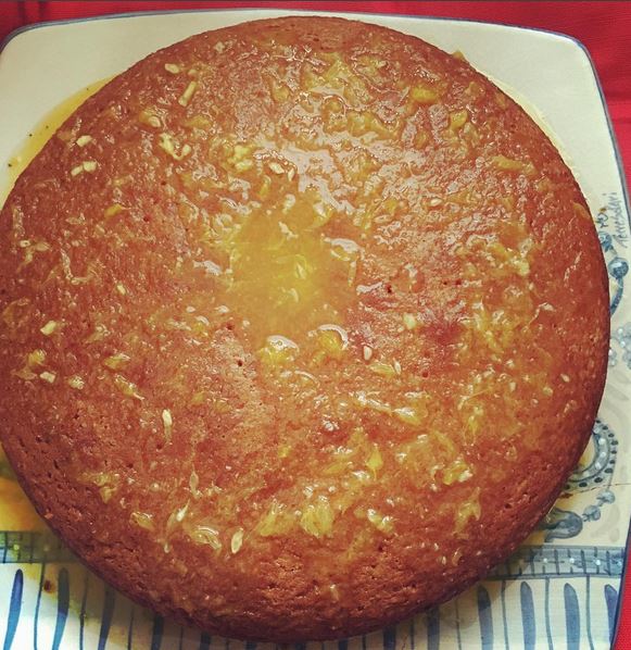 This is one of my favorite recipes my Italian Zia Cici has even given me. It's an orange olive oil yogurt cake and it's so refreshing, light and delicate. Perfect topped with fresh whipped cream or a scoop of vanilla ice cream. 1 (150g) vanilla yogurt container. This will be your measuring tool. 3 eggs 2 yogurt containers of sugar 1 container of olive oil 3 containers of flour Zest of 2 oranges 1 packet of Paneangeli yeast (find on Amazon or Italian store) Mix everything in a bowl and place on spring pan. Bake for 40 minutes at 180c/365farenheit. For glaze take the juice of two oranges and bring to a boil. Add a teaspoon of sugar to make a simple syrup glaze. When cake is cool, take a toothpick and make small holes in cake. Pour glaze over it.