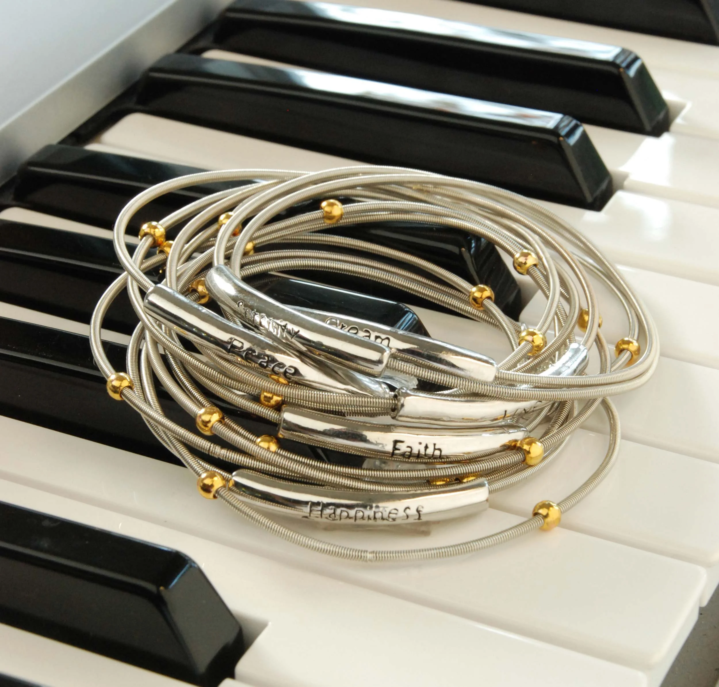 p53_piano_wire_bracelets.jpg
