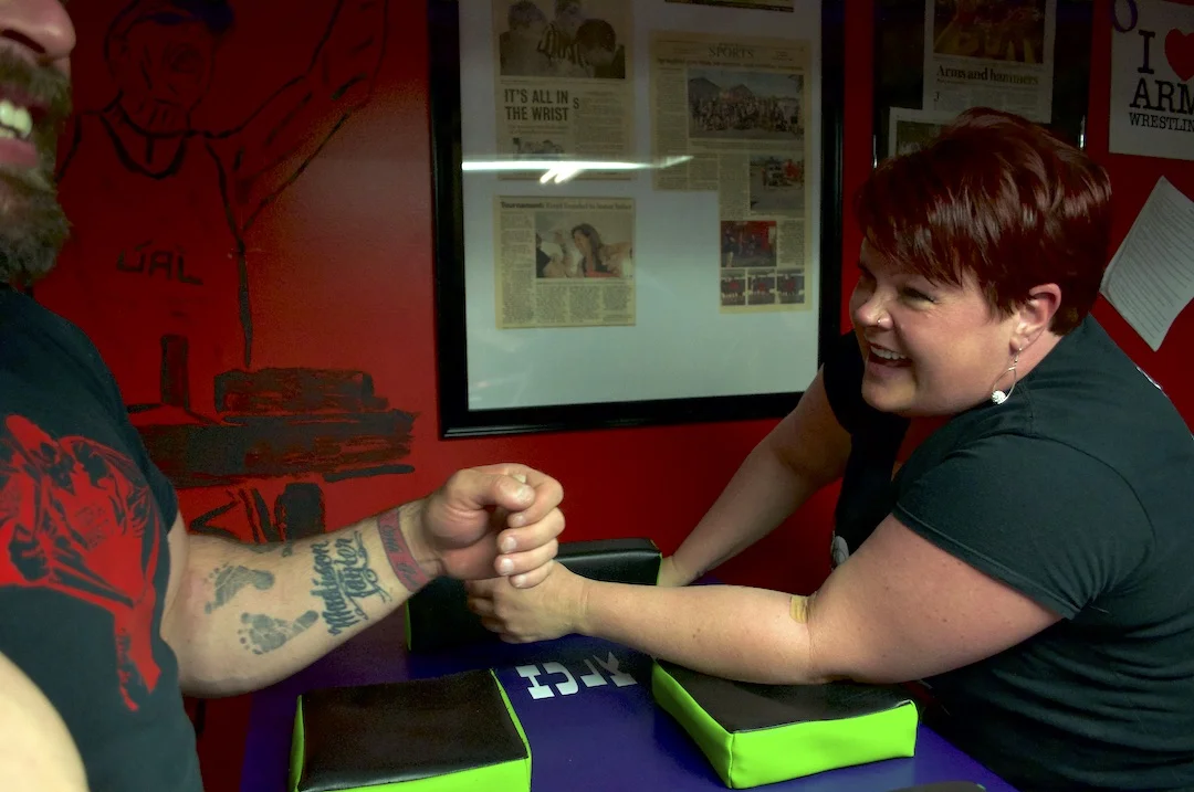 Michelle Price laughs with Will Dinwiddie at an Epic Fitness Solutions practice.