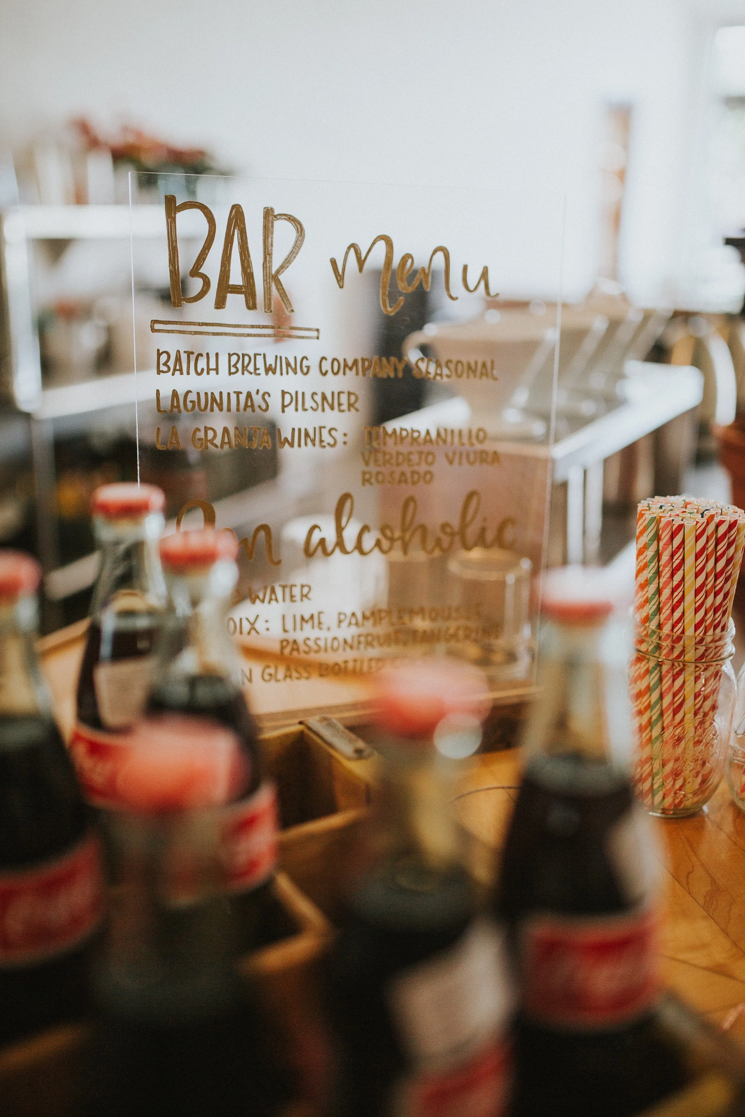 The bar was filled with vintage Mexican coke bottles, craft brews and Trinosophes' specialty coffee. Signage by Mitten Script by Marah . Don't forget a straw!
