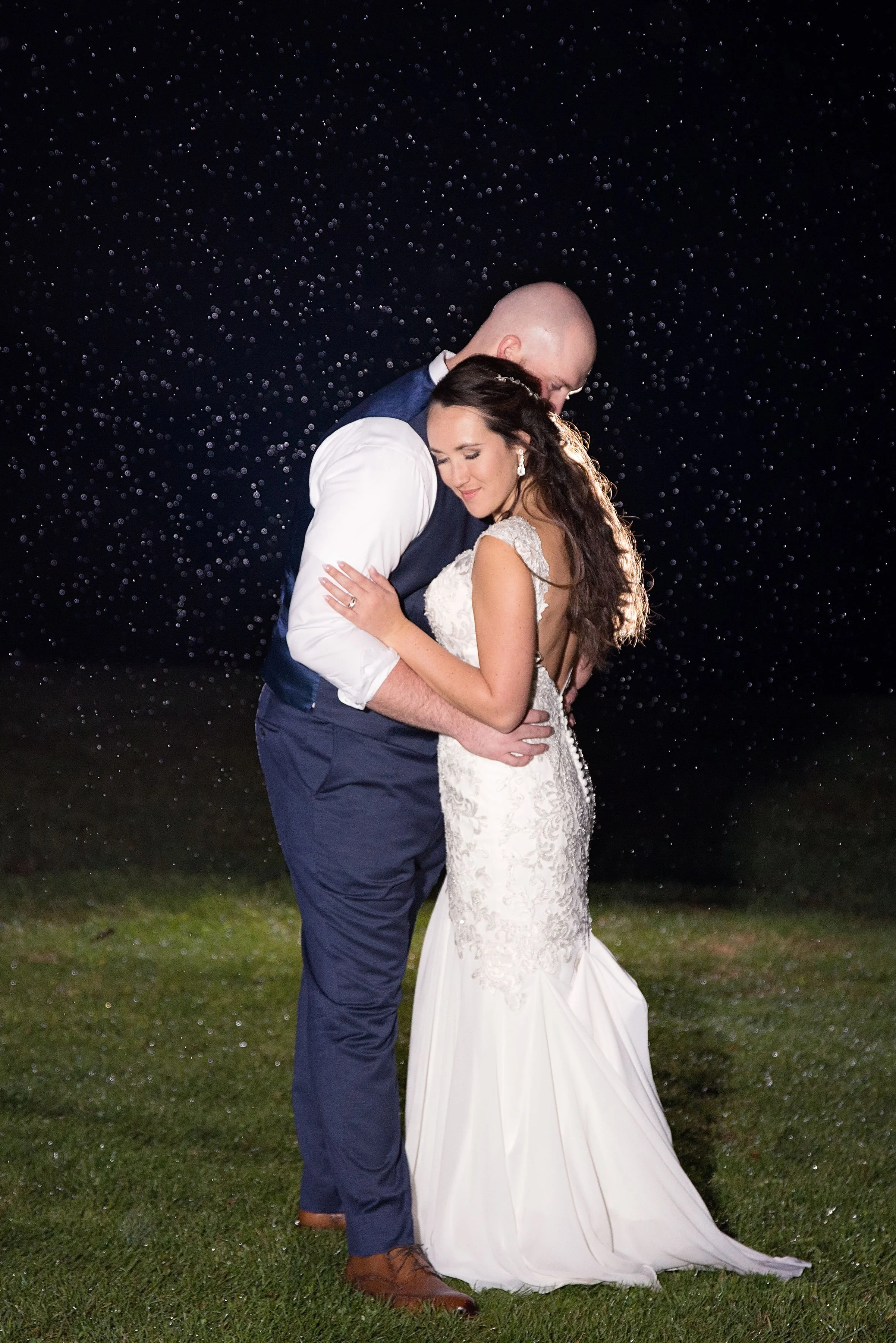 Nighttime rain photo magic by the amazing Lindsey Anderson Photography .