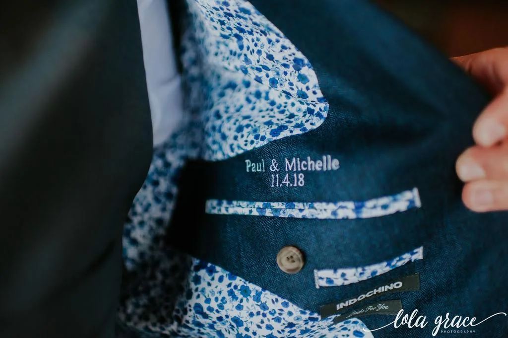 Paul had his suit jacket embroidered with their wedding date! What a great keepsake from their wedding.