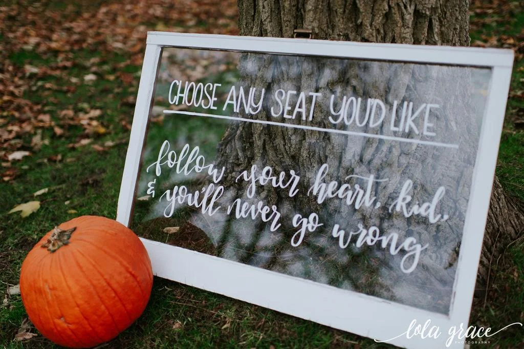 Paul and Michelle wanted to include one of their favorite quotes from “The Sandlot” on their ceremony sign made by Mitten Script by Marah .