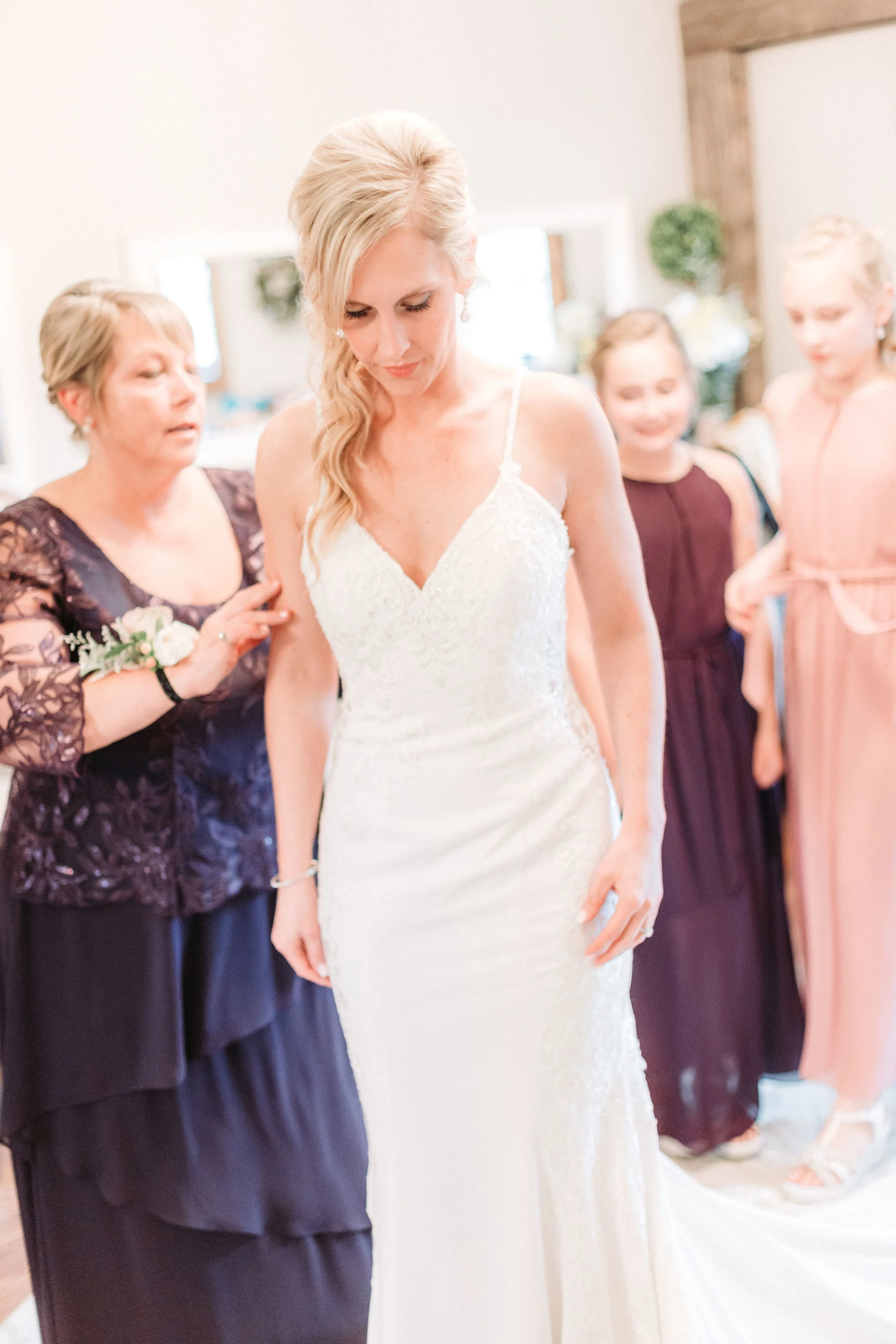 Their colorful spring palette was highlighted in the junior bridesmaid and mothers’ dresses.