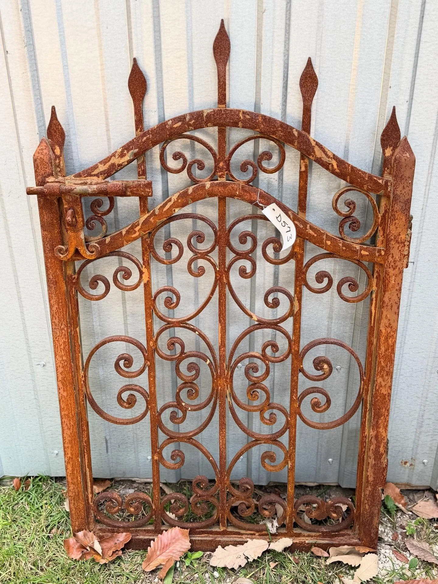 This little iron gate is fabulous! Im reluctant to post because I want to keep. However, I have no {current} place to put it. Another fun find when walking through our warehouses!

Antique iron gate from Europe. Posts shown in second slide. 
27&rdquo