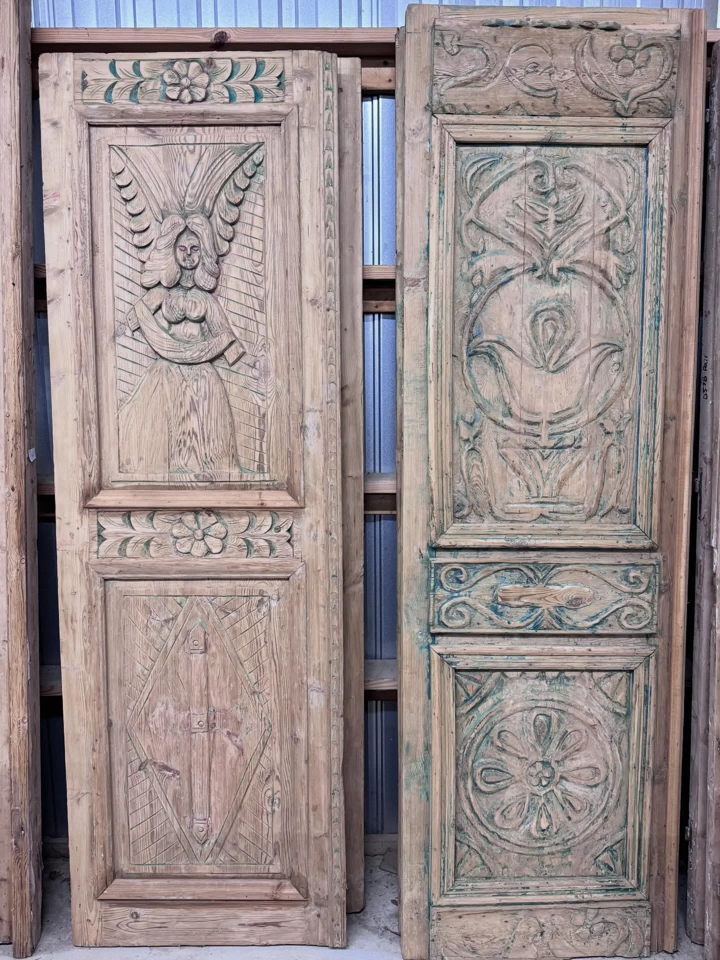 As promised. We teased these yesterday. Who needs a single door with character? Hand-carved pine doors from the French colonies. Circa 1890&rsquo;s. We have two of each shown! 

Left: 29.5&rdquo; wide by 95&rdquo; high. $1075 each (2 available) 
Righ