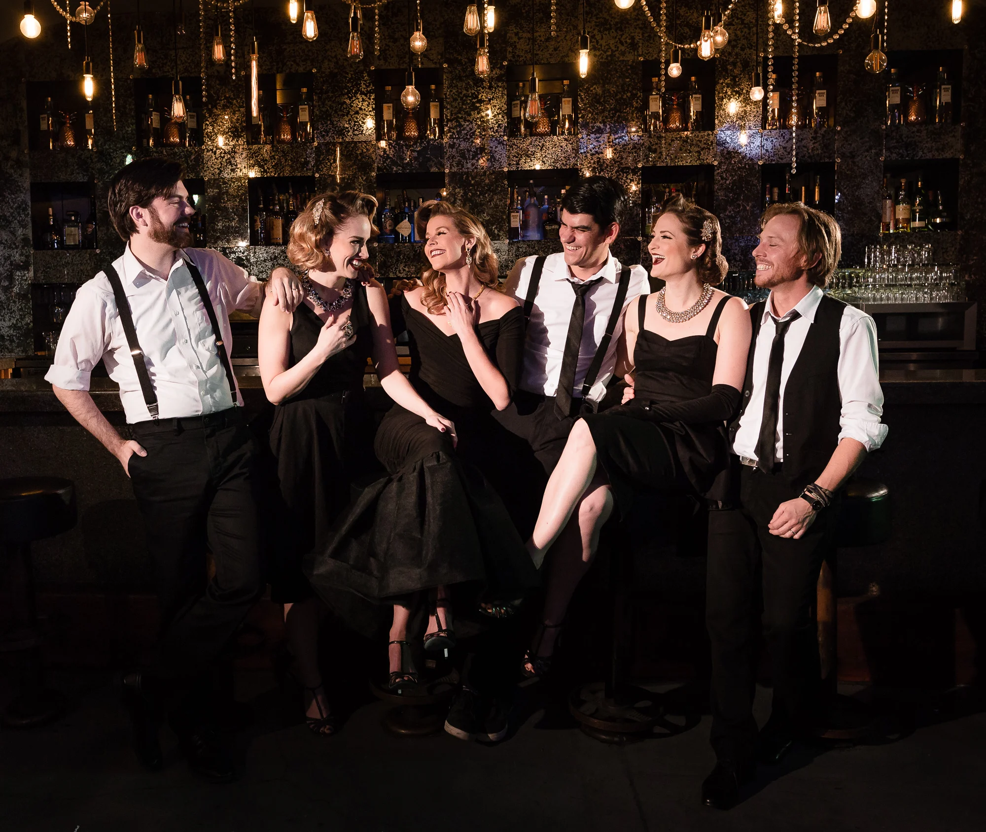 THE ENTIRE BOMBSHELLS FAMILY: JORDAN LAMOUREUX (BASS), TIFFANY DISSETTE, HEATHER LUNDSTEDT O'NEILL, DAVID LAMOUREUX (ARRANGER/BANDLEADER), LEAH SPRECHER AND MATHIAS MINQUET (GUITAR). 