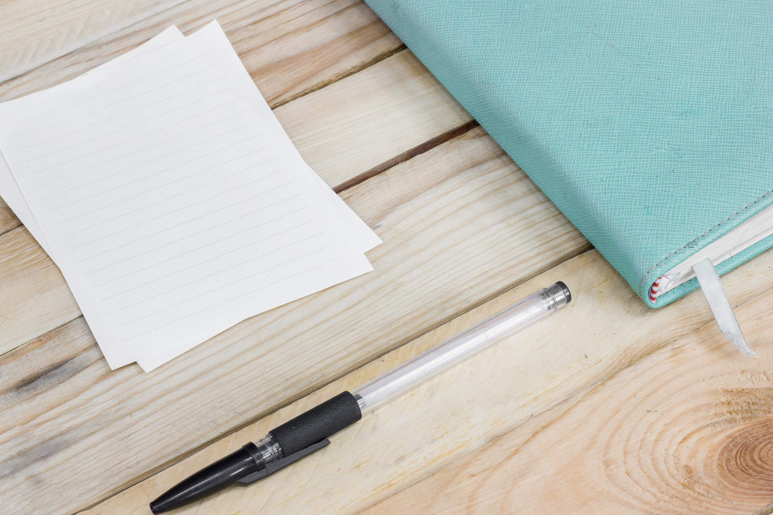 Pen, paper and notebook