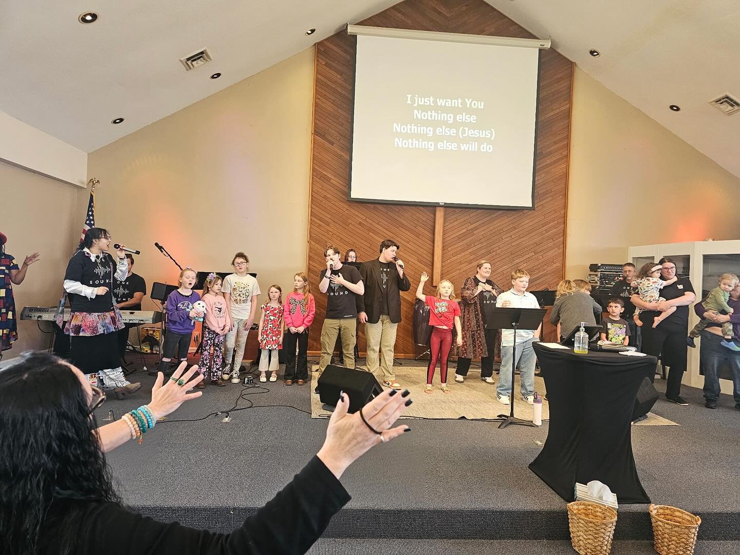 New Covenant Kids joining One Sound on stage.