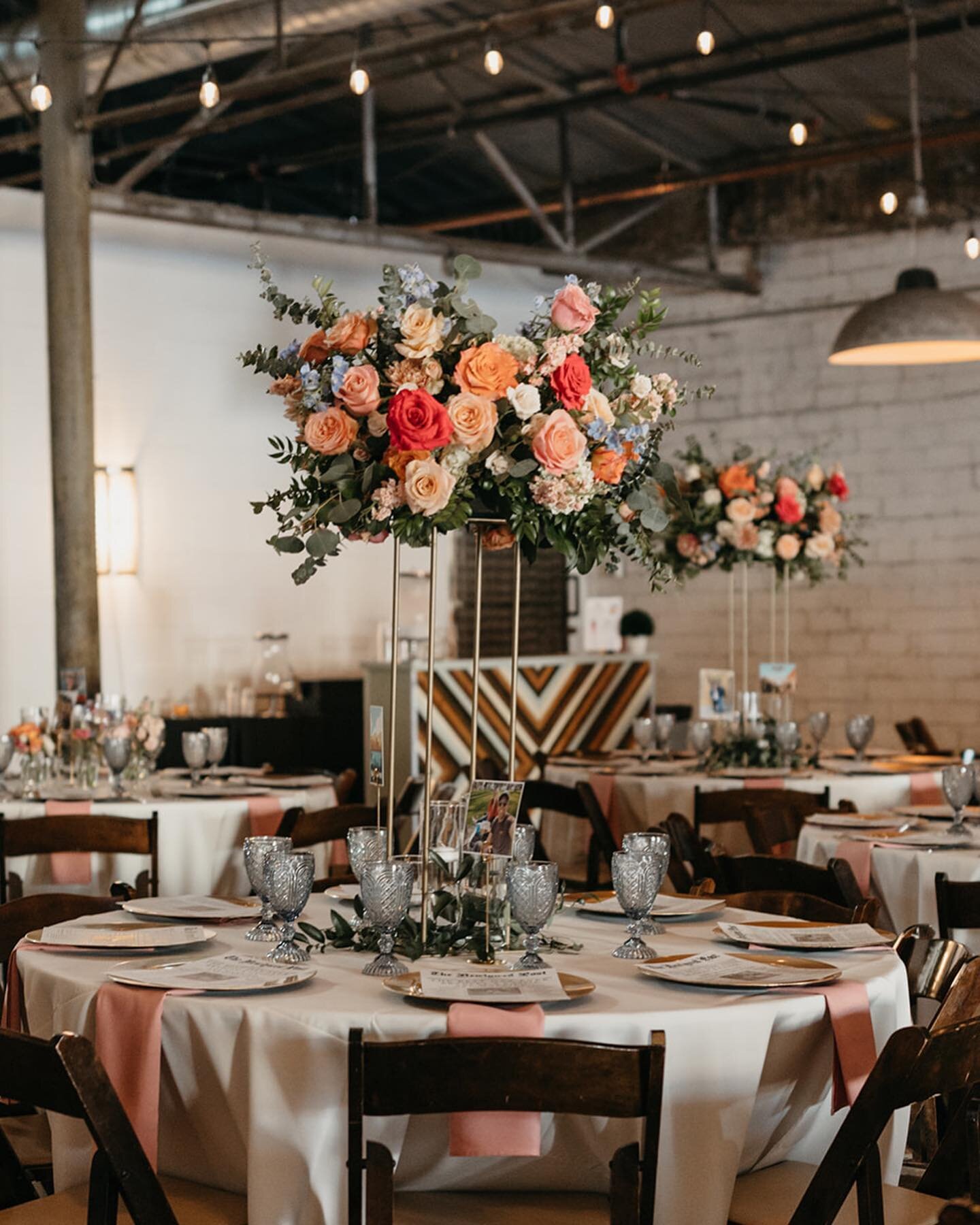 Loving this pretty, bright color palette! 
&bull;
Swipe to see how we used these elevated centerpieces for the ceremony space too!

Photo @wilderlove.co 
Floral @thelacebouquet 
Venue @4elevenfw 
Coordinator @toastdfw