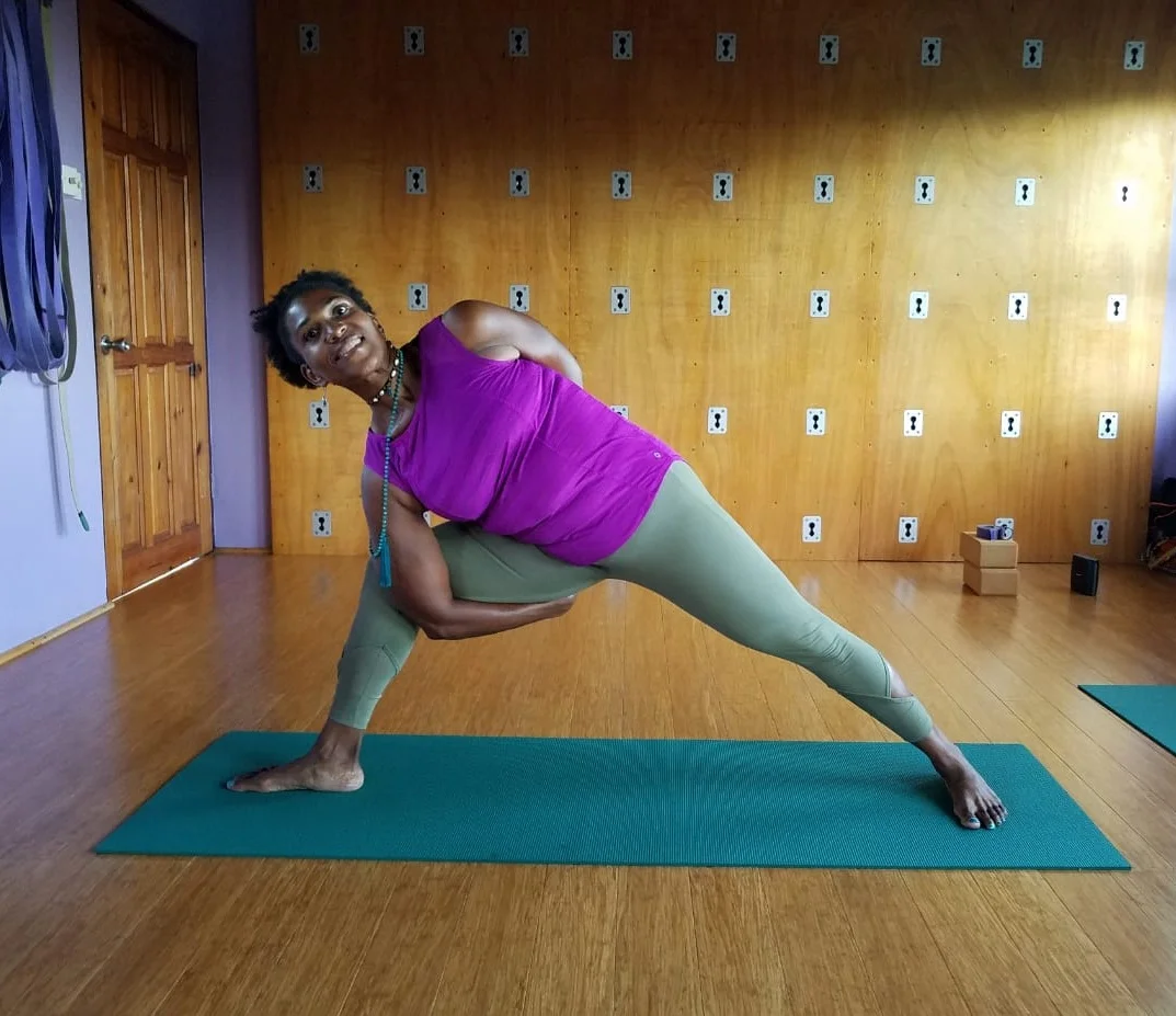 Guest yoga teacher, Marcia Cameron, in Bound Extended Side Angle Pose.