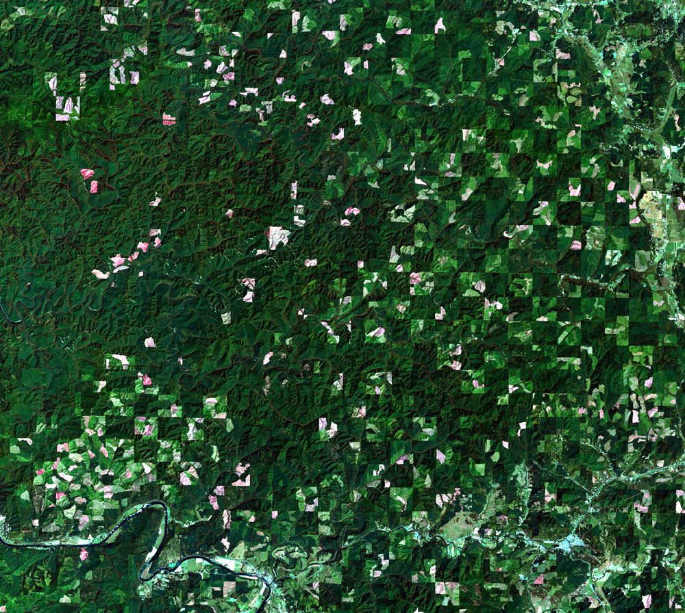 The checkerboard land ownership pattern as it appears from satellite, USGS