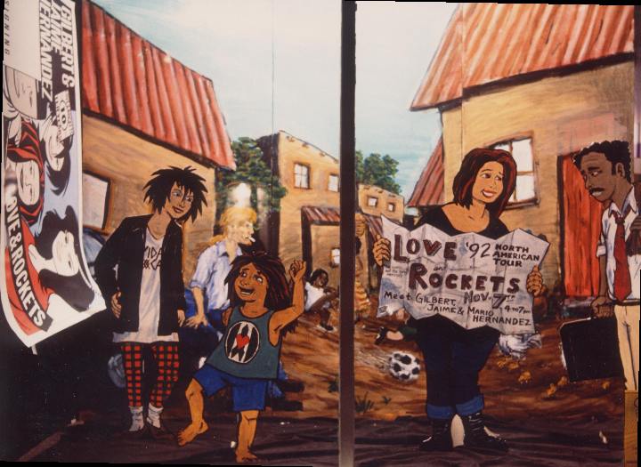  Love &amp; Rockets. Photo by Dennis McGovern. Art by Chris Hsiang. Love &amp; Rockets characters (c) Gilbert &amp; Jaime Hernandez. Done for signing by Hernandez Brothers.   