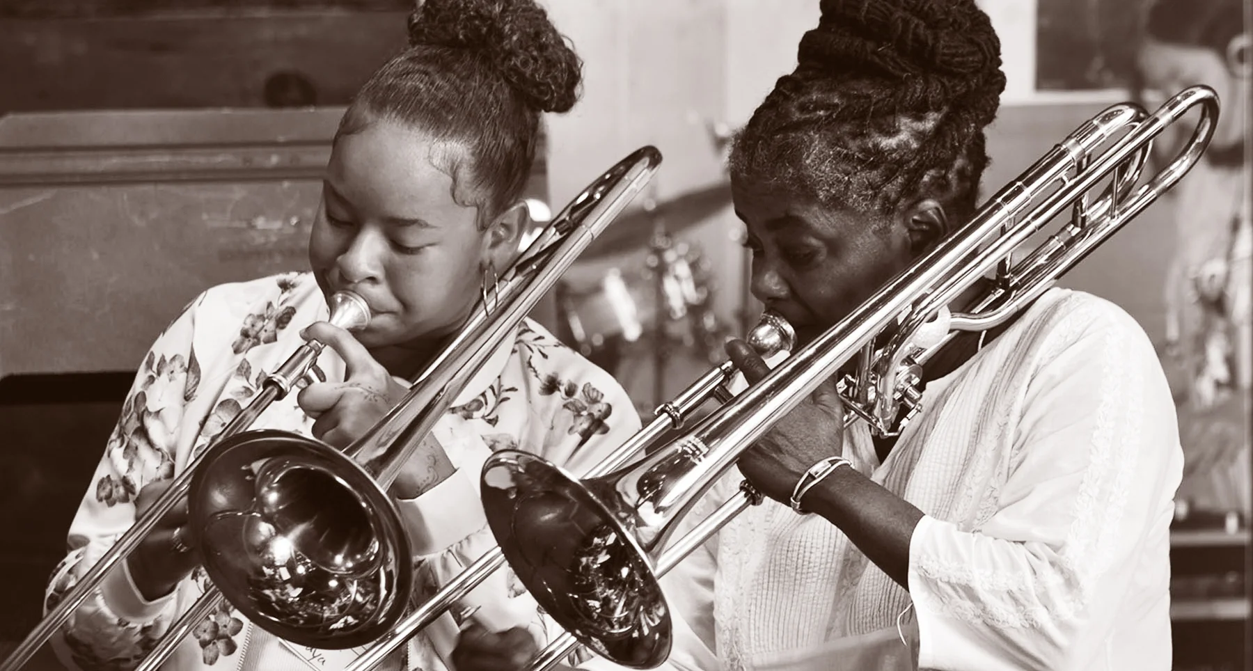 Angela playing with student from Black Girls Play, an OPC Music program.