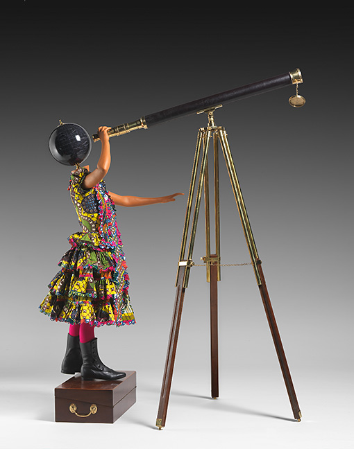 Yinka Shonibare, MBE British-Nigerian (born 1962). Planets in My Head, Physics , 2010. Mannequin, Dutch wax-printed cotton, leather and fiberglass, 50 x 26 3/8 x 19 5/8 inches. Purchase: acquired through the generosity of G. Kenneth Baum in honor of Ann Baum, on the occasion of her birthday, 2011.23.A-E. © Yinka Shonibare. Courtesy James Cohan Gallery, New York/ Shanghai / Artists Rights Society (ARS), New York.
