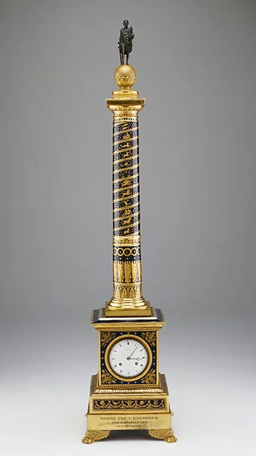 Jean-Joseph Lepaute , clock movement, French (1768-1846). Sèvres Imperial Manufactory, manufacturer, French (1756 – present). Clock , 1813. Soft-paste porcelain with gilding, copper alloy with mercury gilding, and brass movement, 51 1/2 x 11 1/2 x 11 1/2 inches (130.8 x 29.2 x 29.2 cm). The Nelson-Atkins Museum of Art, Kansas City, Missouri. Gift of Mr. and Mrs. Harry J. Renken Sr., F66-44.