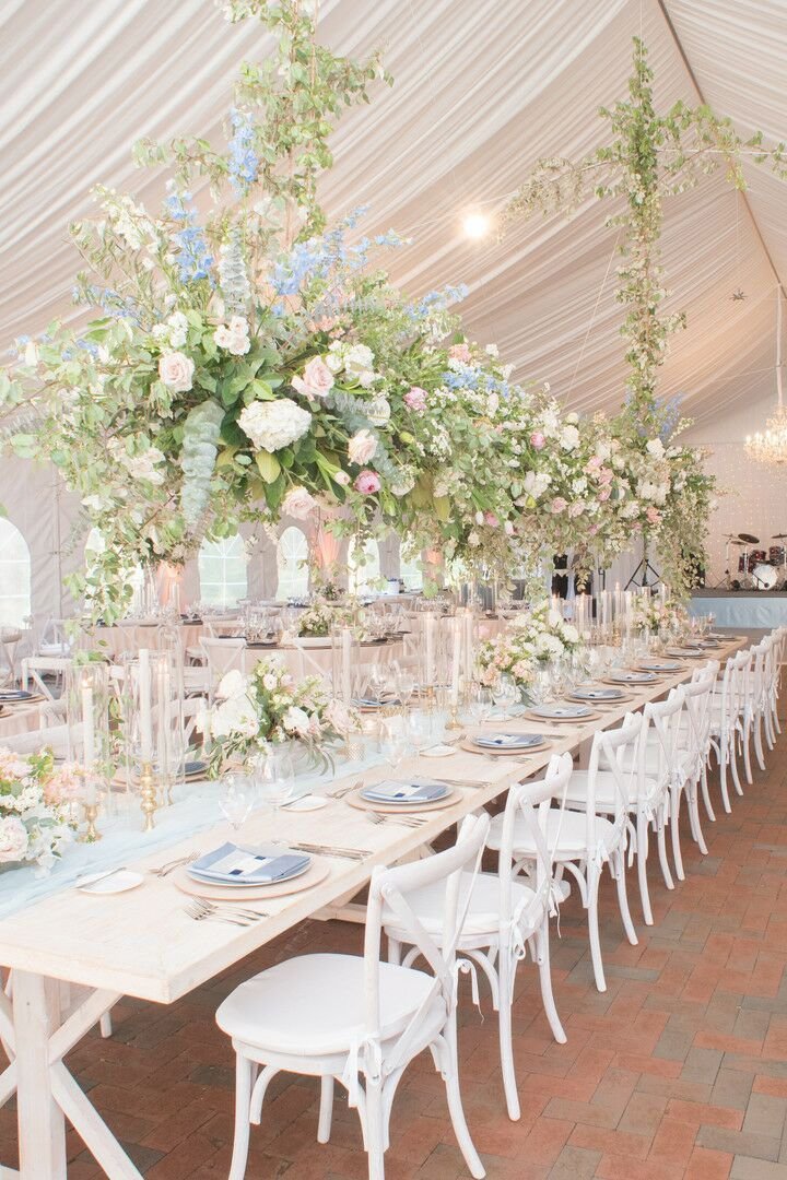Tented Reception with White Tables and Tall Pastel Flower Arrangements.jpg