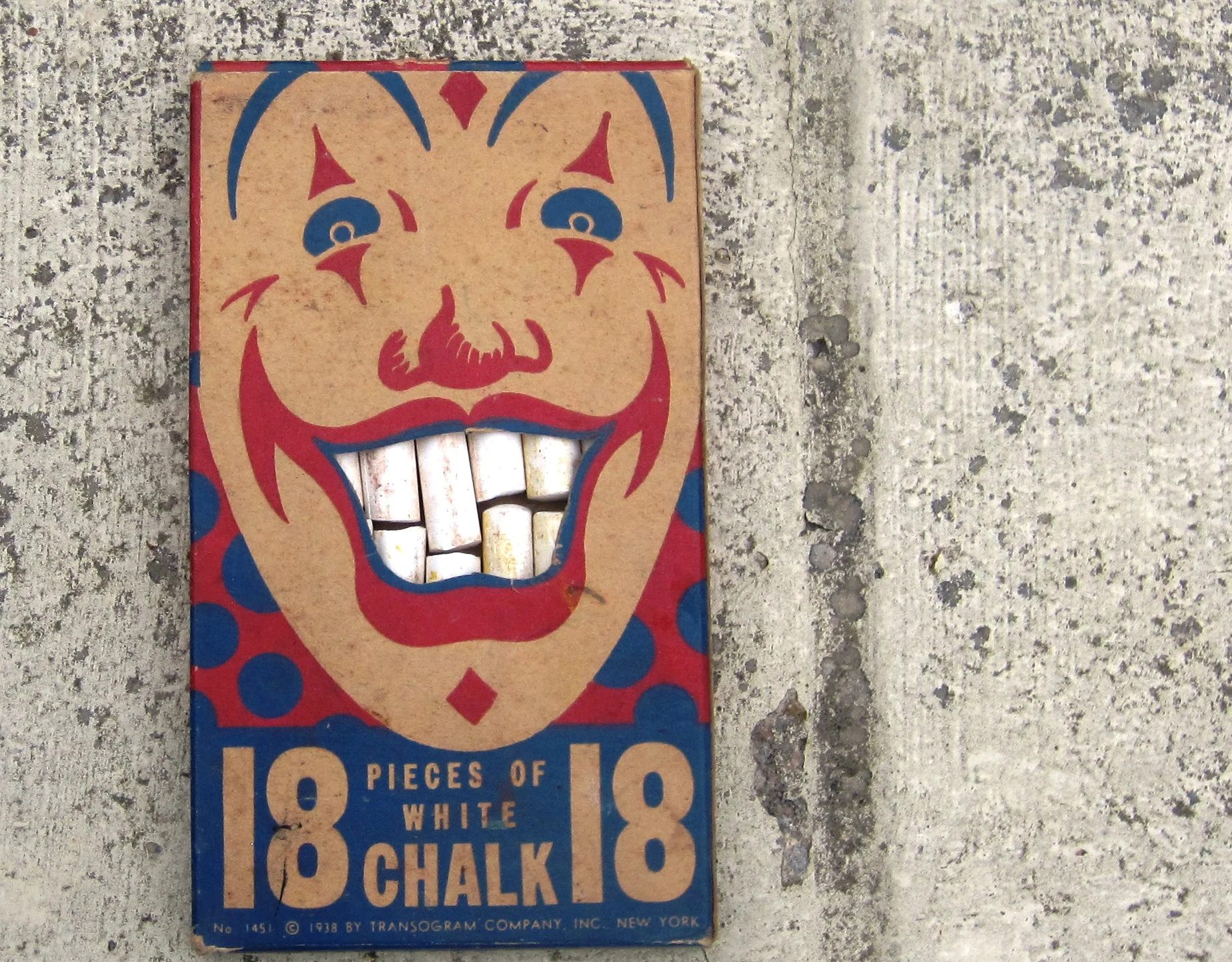 retro 50's vintage chalk box with creepy clown face