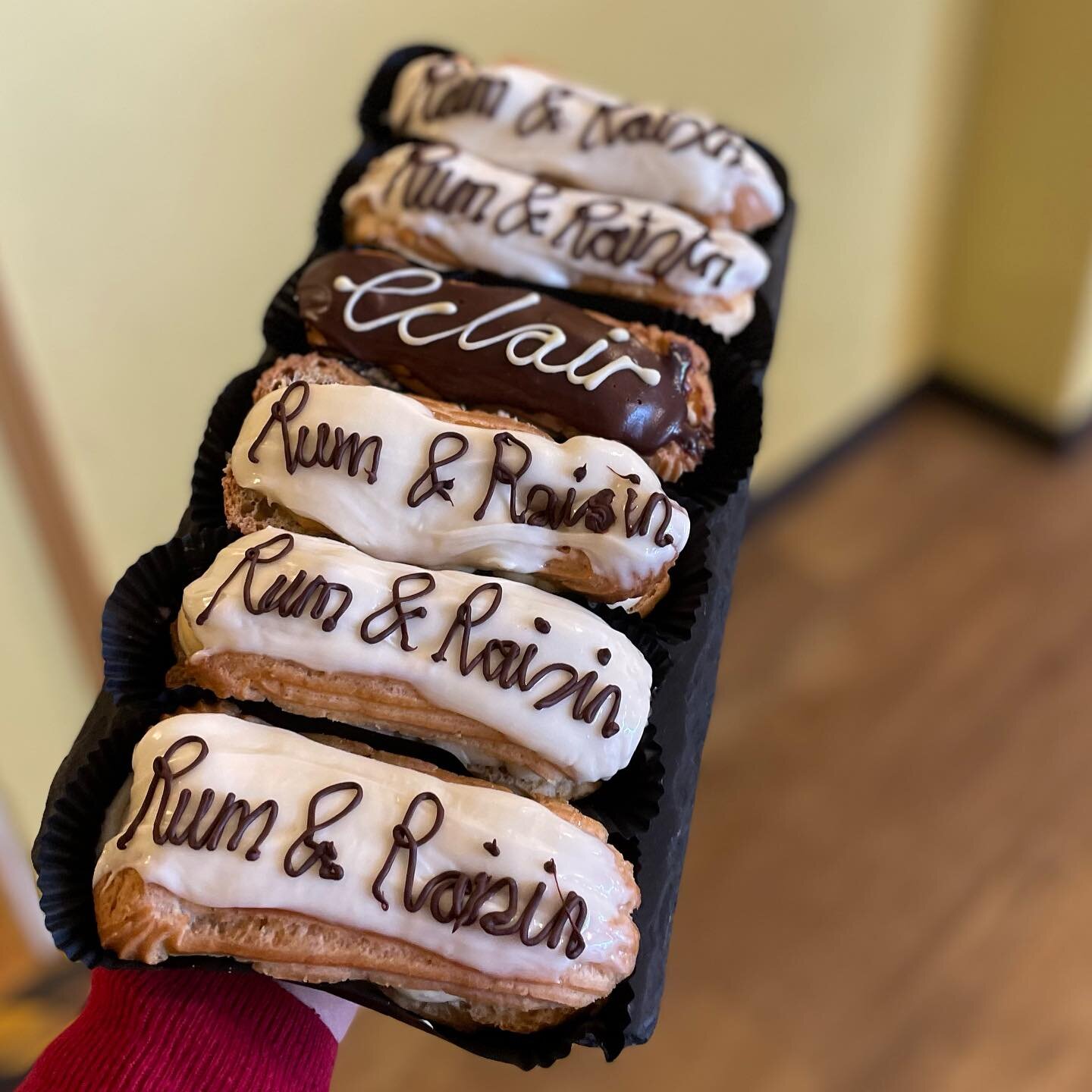Getting festive today! Yummy homemade eclairs with rum &amp; raisin cr&egrave;me diplomat filling. Treat yourself after your Christmas shopping!