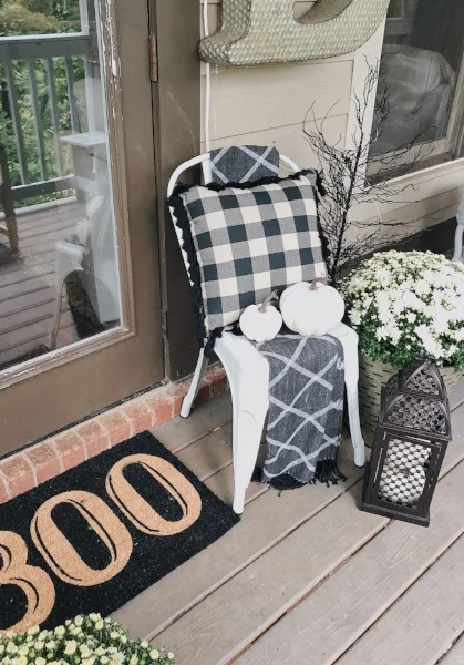 zoomed out view of halloween decor by door