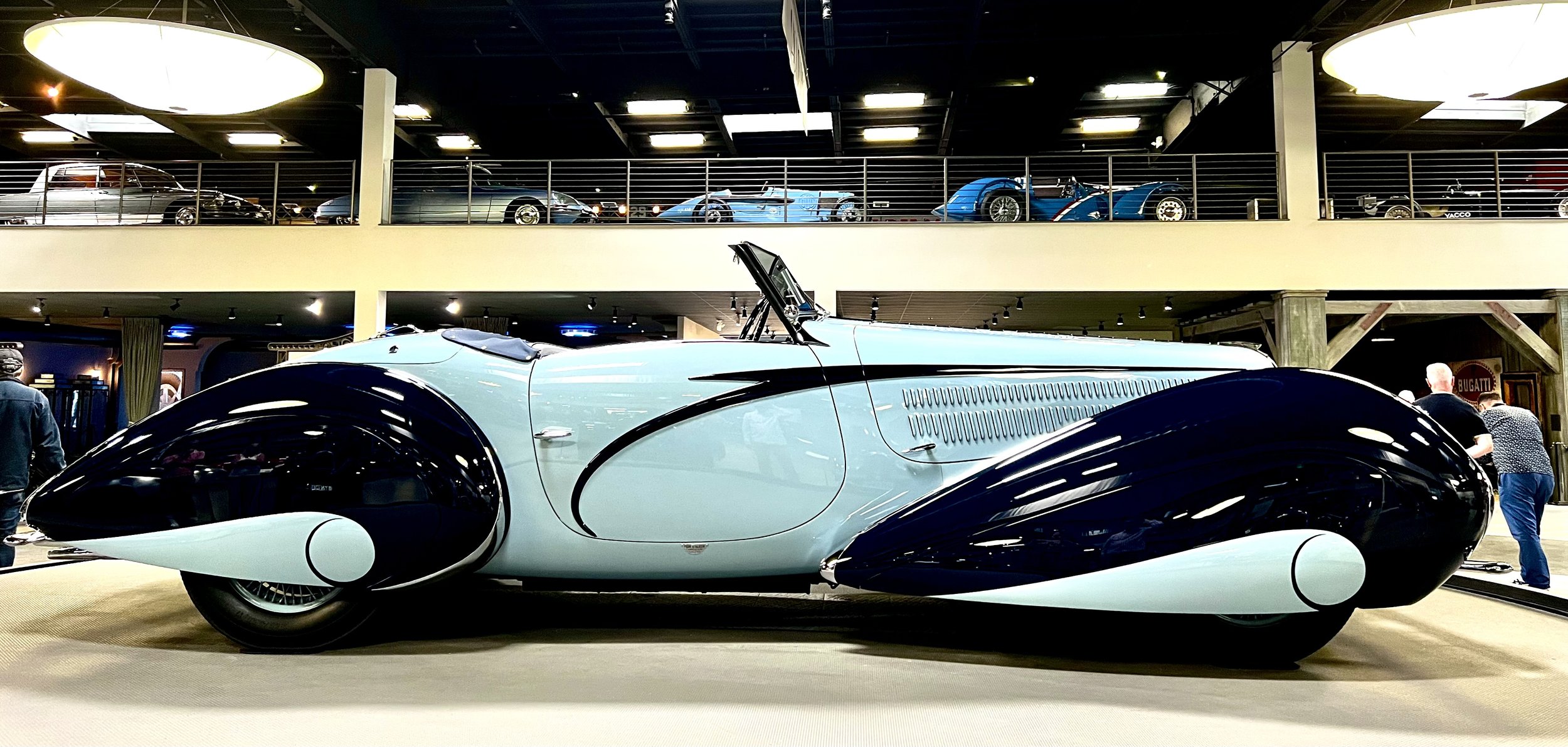 5-1938 Delahaye 135M Cabriolet by Figoni & Falaschi with Grand Prix race cars and Citroens above.jpg