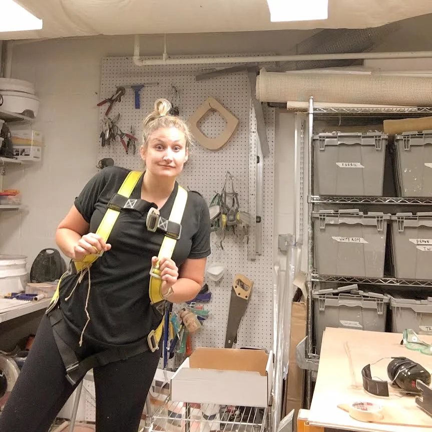 So..... installation involved donning a harness, getting hooked up to climbing ropes and climbing 30 ft. above the floor into the store rafters - AGH