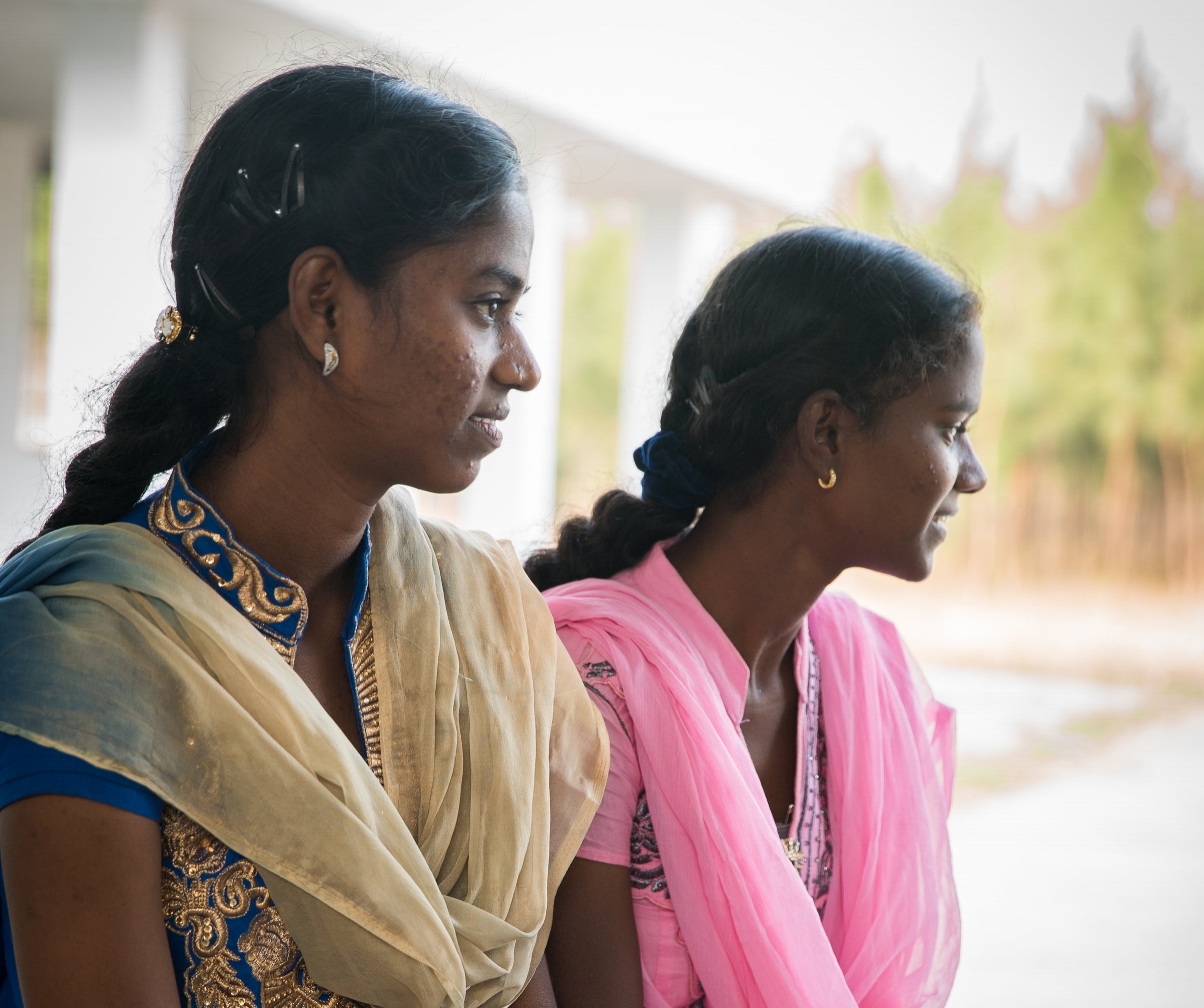 Pavani and Lavinia enjoying a visit back to the orphanage where they grew up