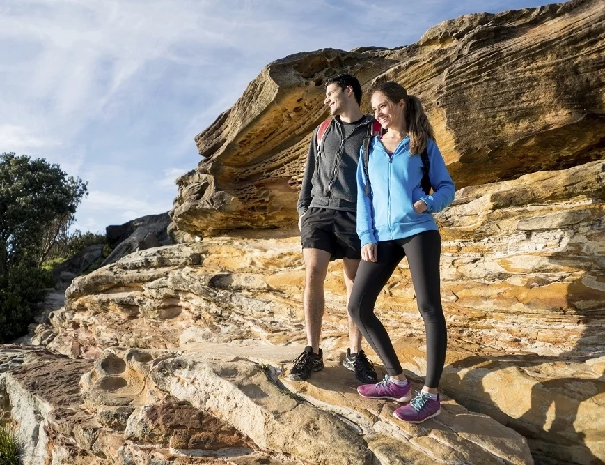 Couple standing on rocks in Sherpa 1000px.jpg