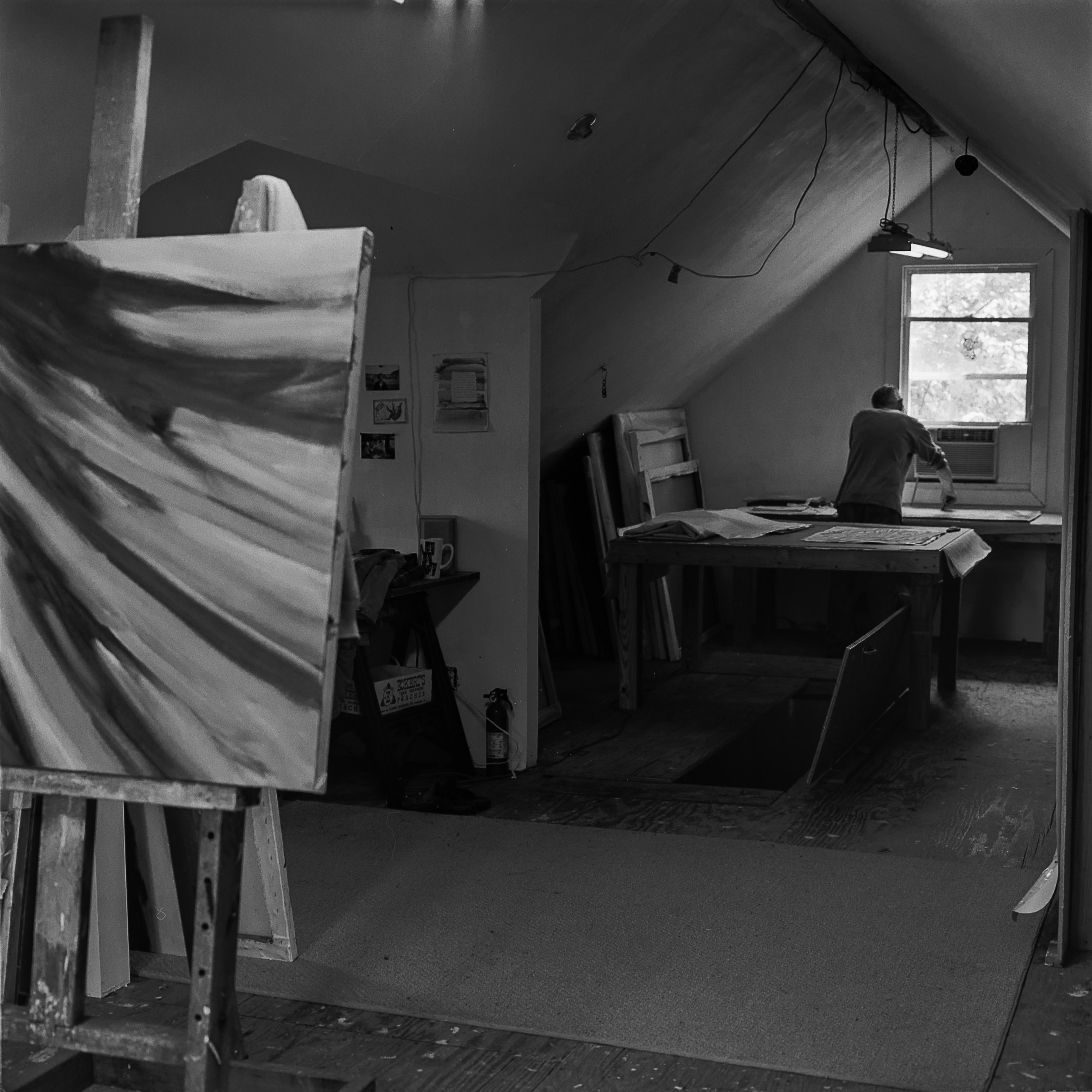  The artist Thomas Joseph painting in his studio on a farm near St. Louis, Missouri. 