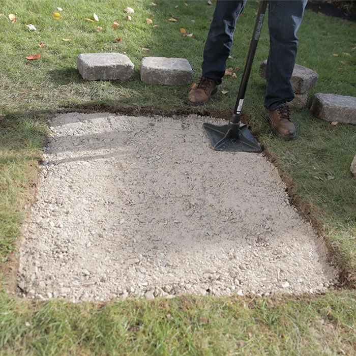 how-to-build-a-custom-fire-pit-tamp-paver-base.jpg