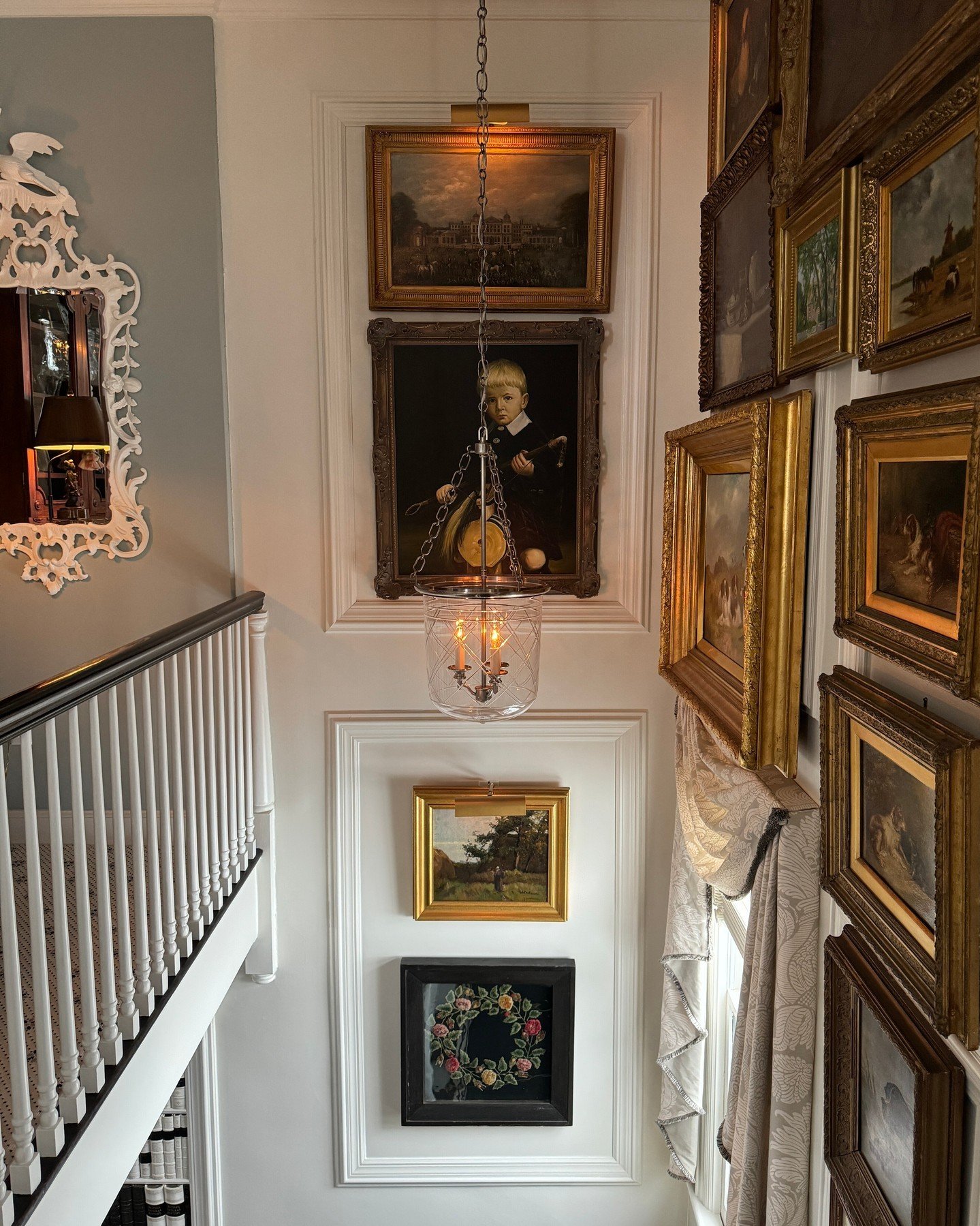 Unveiling the magic where design meets art - a snapshot from the front hall of our Principal&rsquo;s parents home, showcasing a gallery wall of artwork curated with care. We love  the intricacies and charm of each frame, along with the thoughtful pla