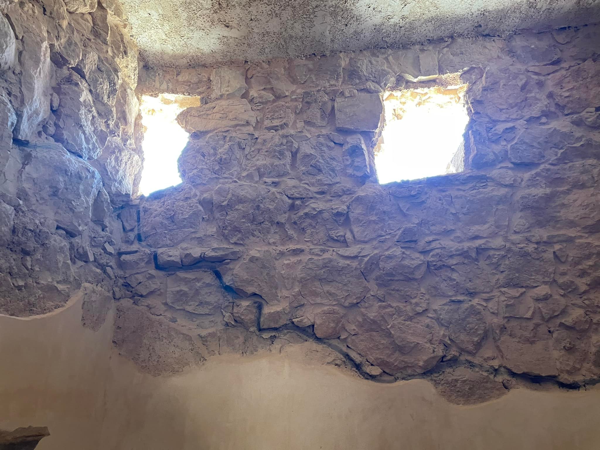  The windows were cut up high to let in light and let the heat out. It was 99° as we toured this site. 