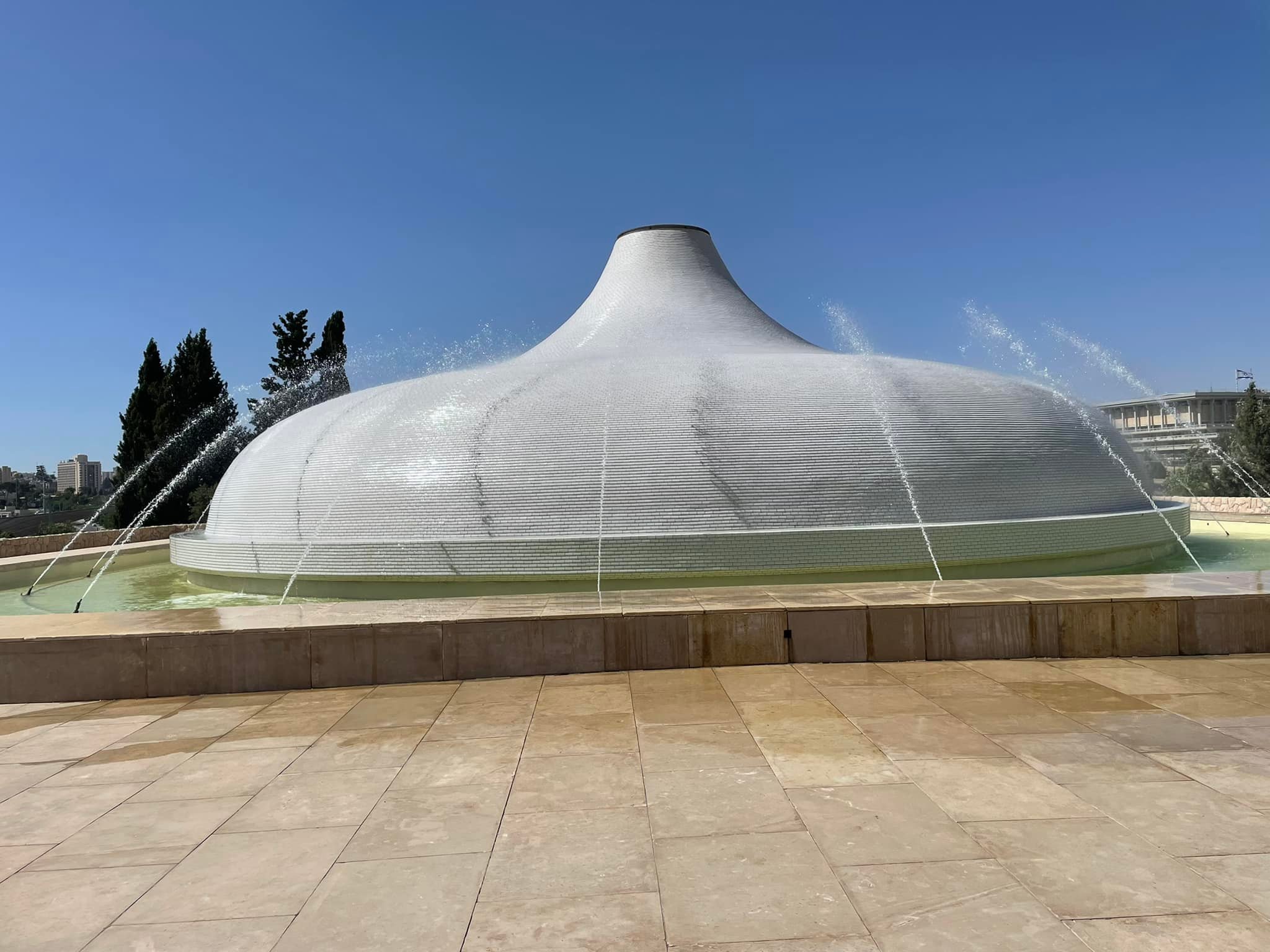  This fountain is meant to commemorate perhaps the greatest treasures in this museum. It is meant to be the shape of one of the top of the clay jars which held the scrolls found at Qumran. 