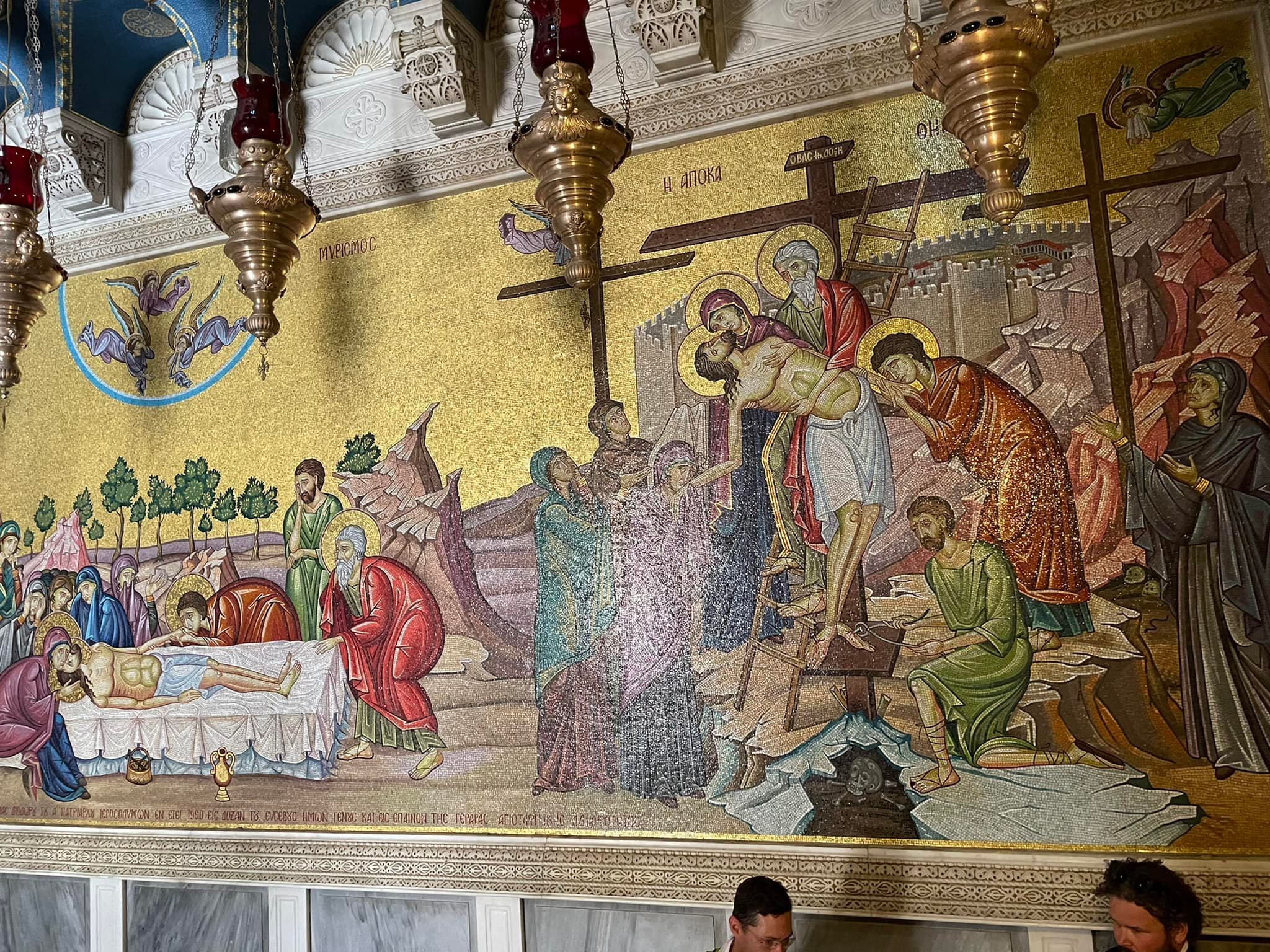  This mural adorns the main entrance. Look what’s underneath Jesus’ feet. We will explain that in just a moment. 