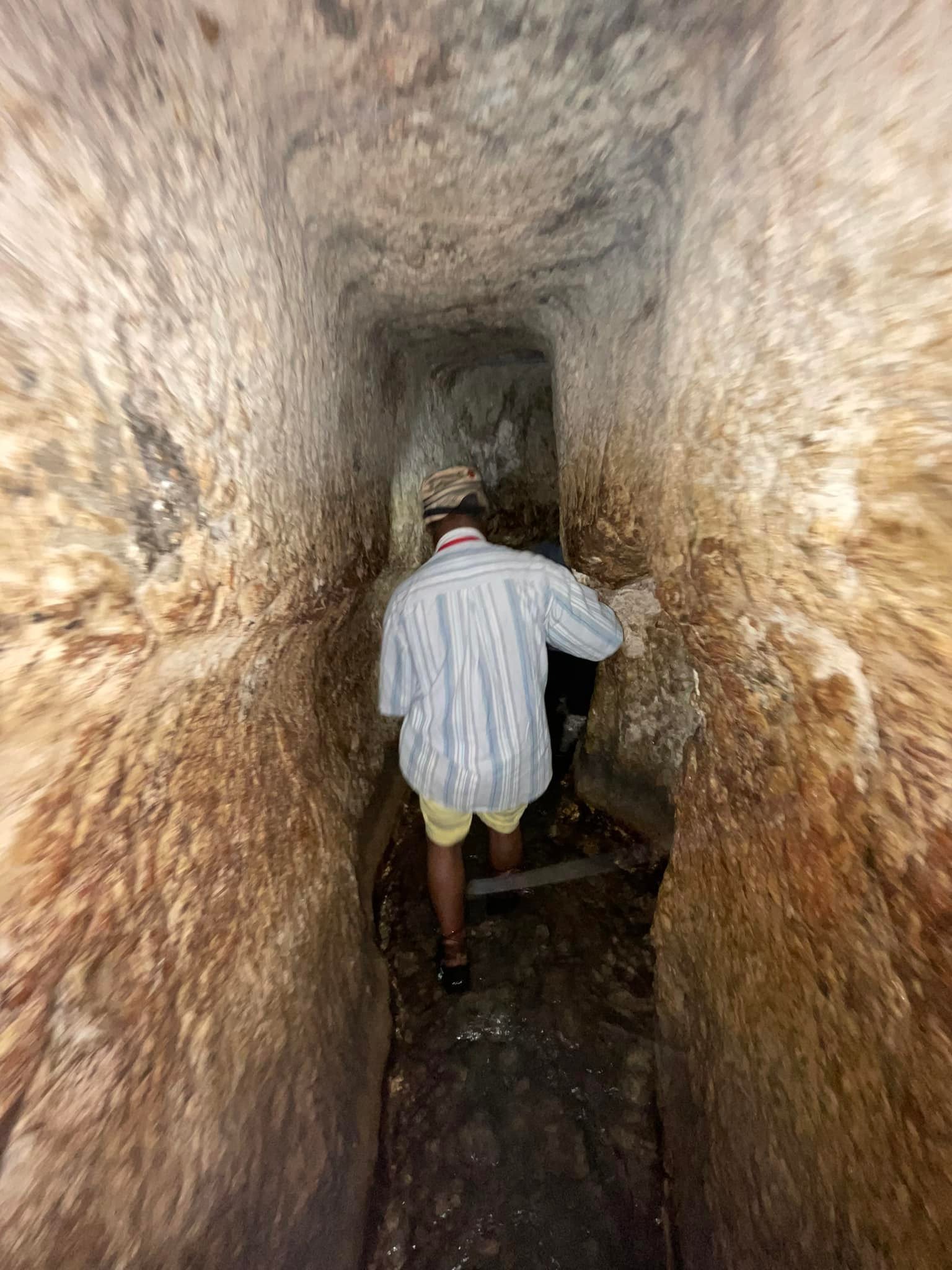  Now we are in it! The water was initially up to about my mid thigh, but quickly settled down to just ankle deep. However the tunnel is 500 yards long. It gets pretty low in some places and pretty narrow and others. Adding to the adventure, we had do