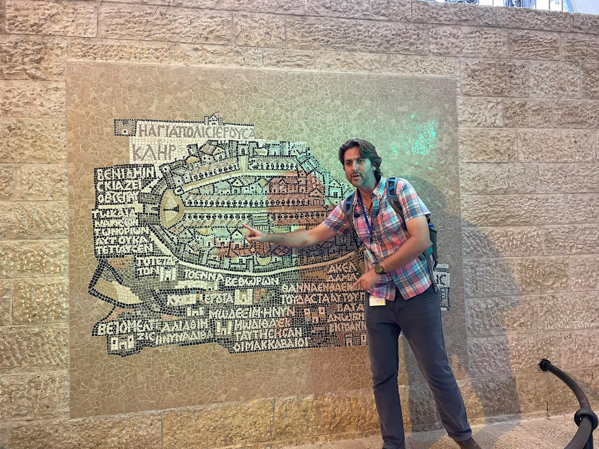  Erez shows us where the road would run. 