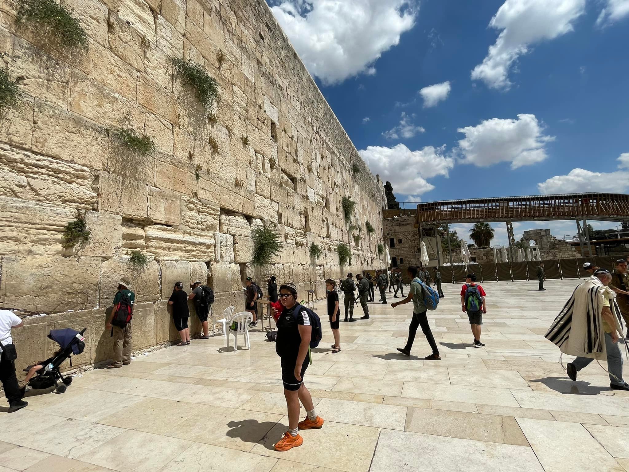  The Wailing Wall. It is called that because the Jews come there to pray for the restoration of the temple. The stones are part of the retaining wall for the foundation of the Temple Mount. The first seven layers are from Herod the Great’s time. The 
