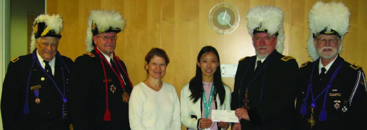 A $65,000 check was presented to Dr. Hu by Sir Knights Stuart Drost, Northeastern Department Commander; officers of the Grand Commandery of MASS/RI, Mark Kay, Grand Commander; Richard Seychew, Past Grand Commander; and Richard Van Doren, Honorary Pa…