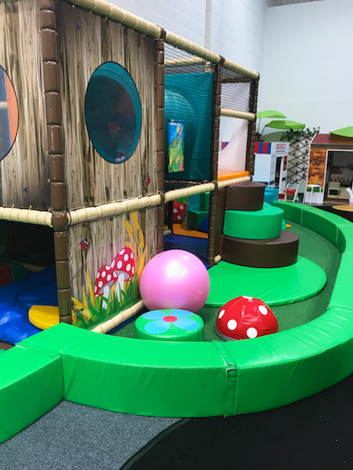 The tots softplay area has different levels and textures for sensory play.