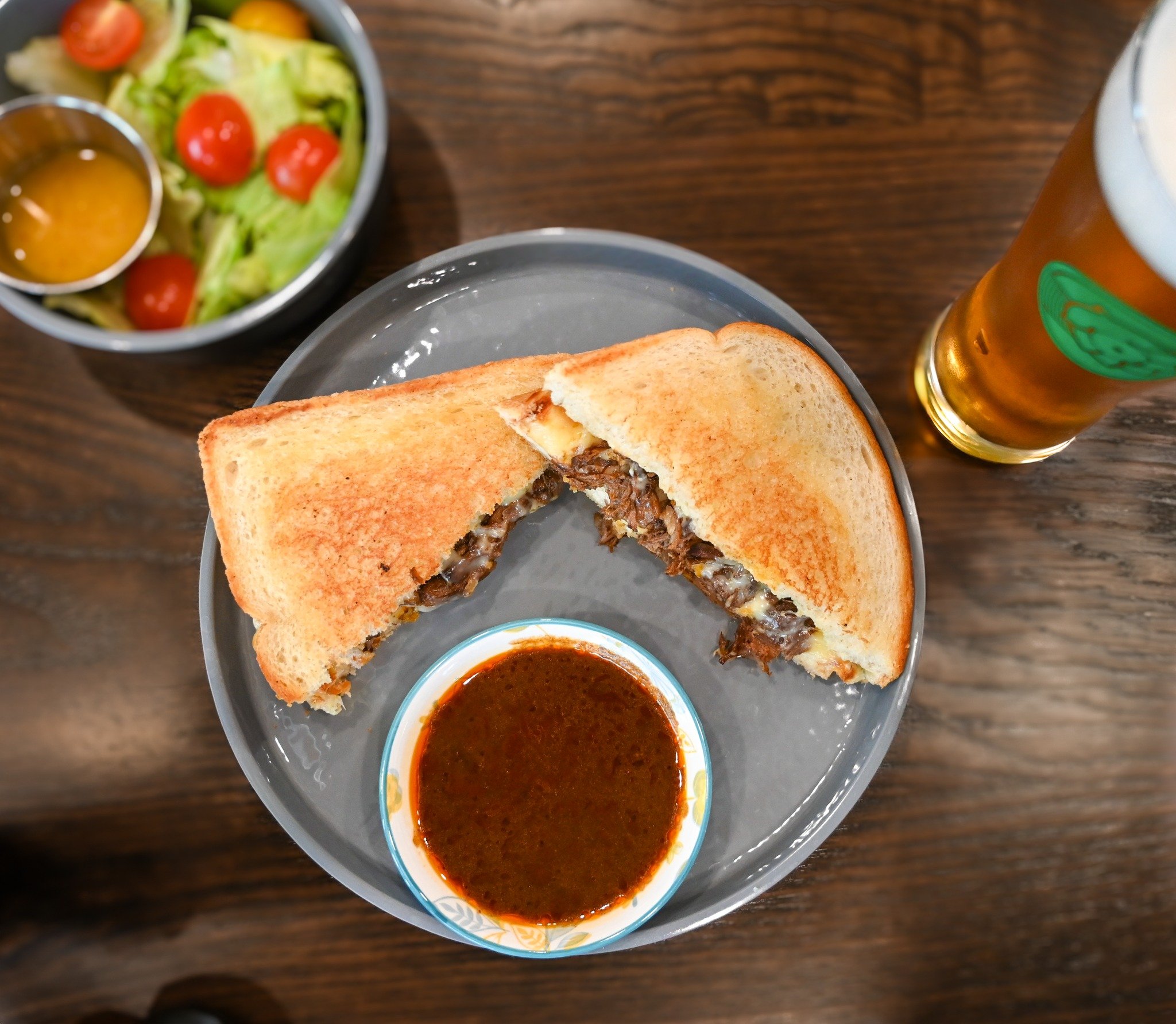 Our Beeria Grilled Cheese is mouth watering! 🤤 Made with White American &amp; Boursin Cheese, Consum&eacute;, Beeria Shredded Beef, all sandwiched between two pieces of Thick Cut White Bread. Add a side salad or fries and a Voss K&ouml;lsch to make 