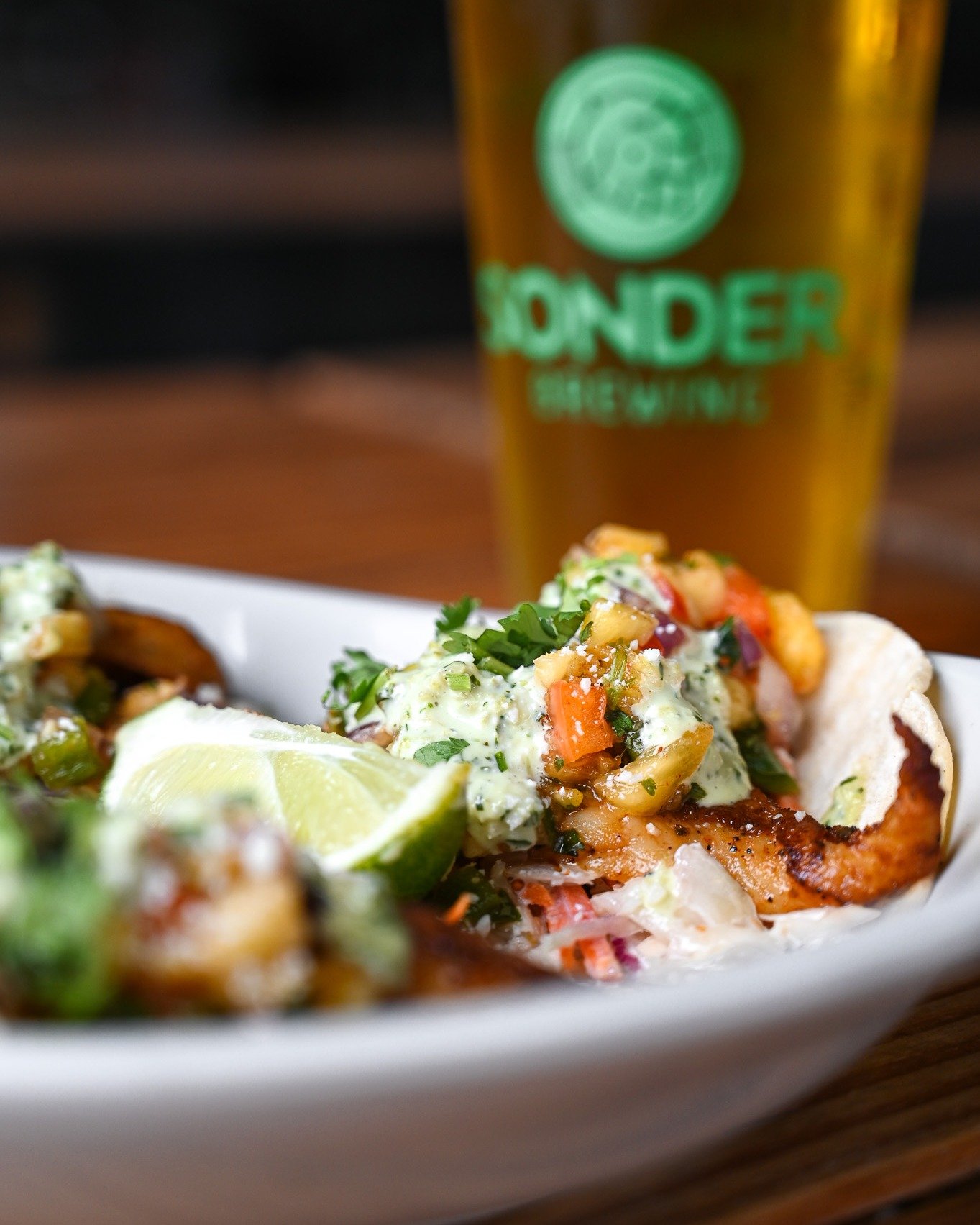 Fish Tacos have entered the chat. Now available at our Mason location. Three corn tortillas loaded with grilled sole, slaw, fresh pineapple salsa, jalape&ntilde;o ranch, and cotija.Ready to discover your new favorite beer &amp; food pairing?