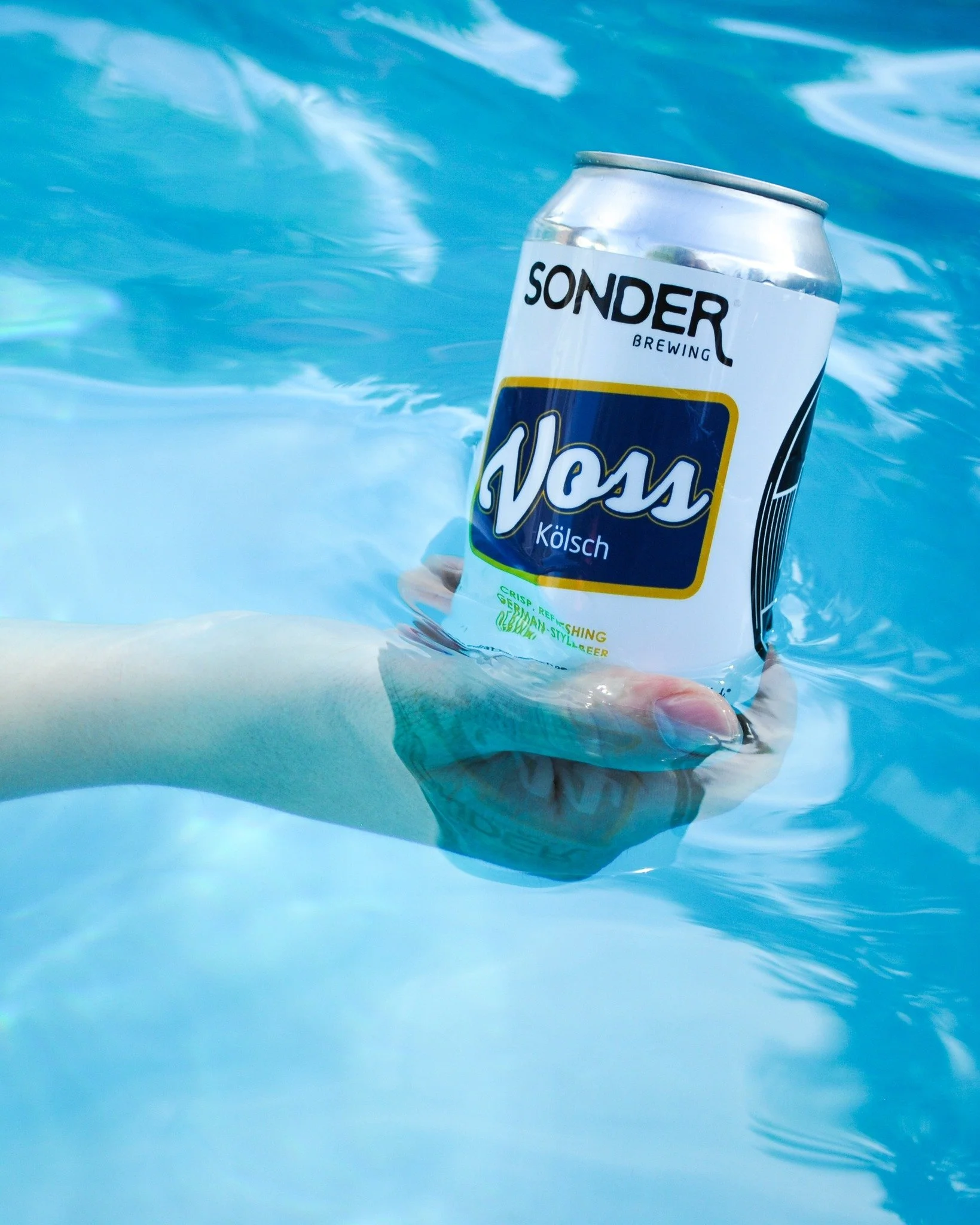 Well-lagered, crisp, and refreshing. Voss loves a pool day.