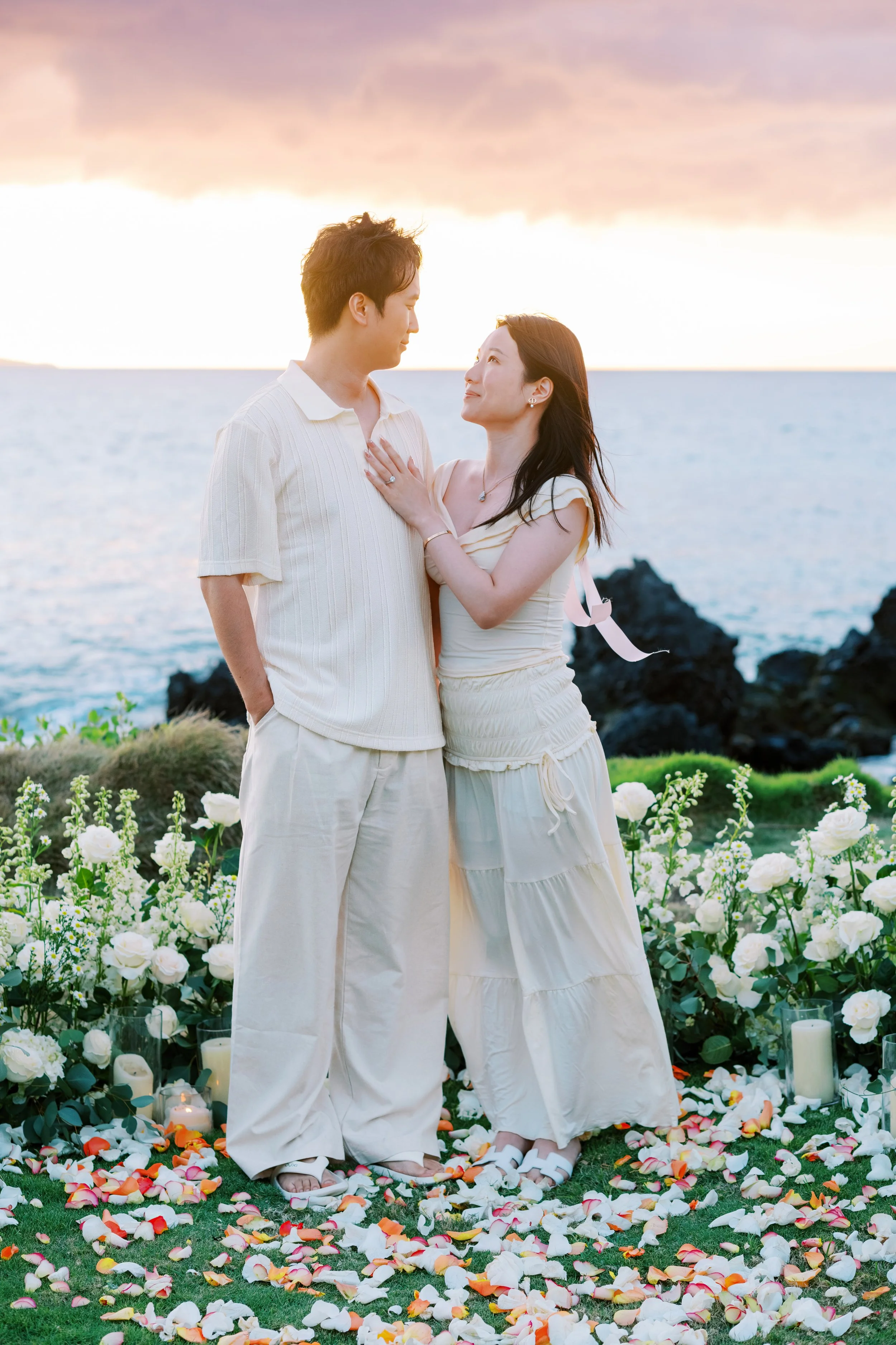 Oceanfront proposal at White Orchid Beach House overlooking the South Maui coastline.
