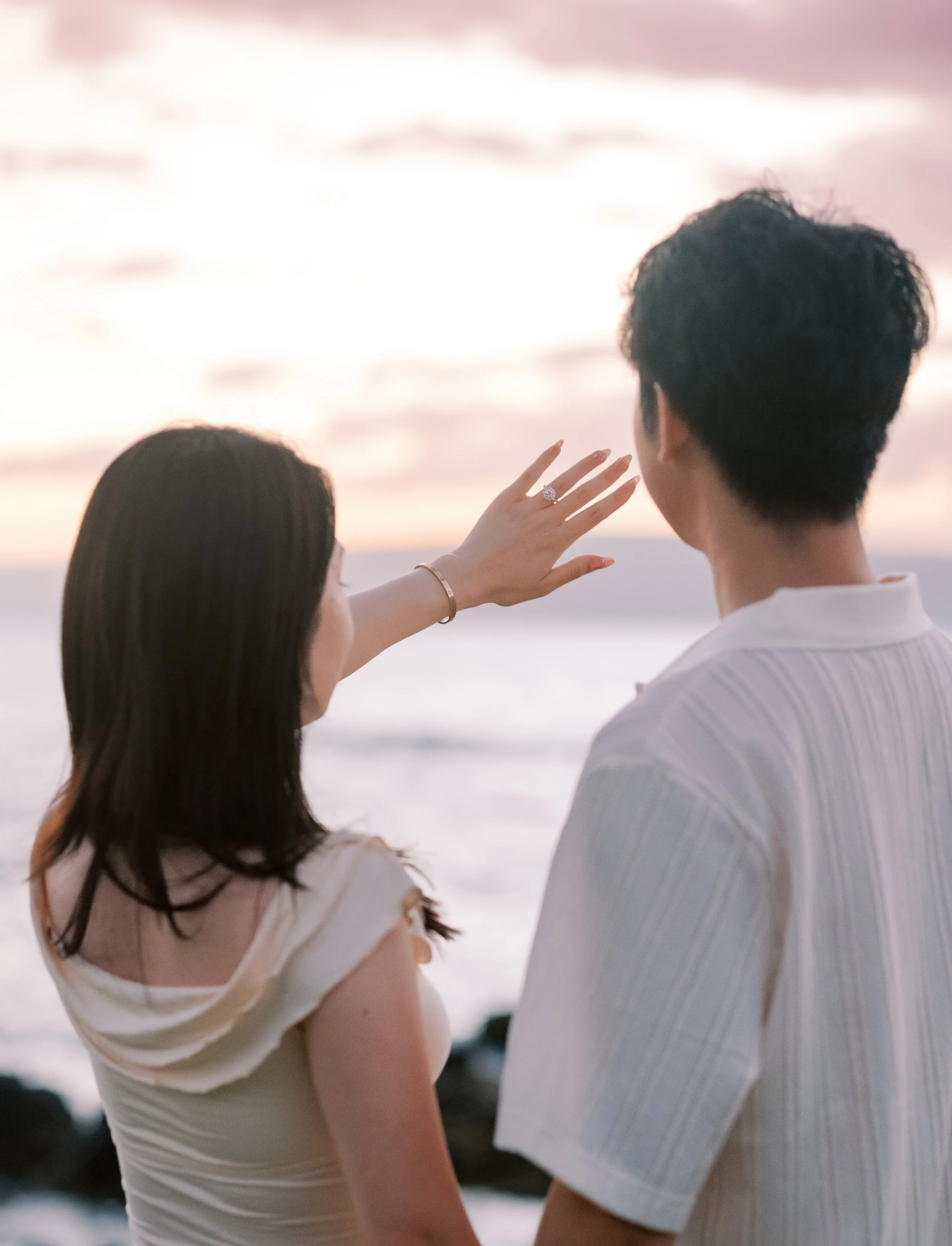 Maui's top engagement photographer capturing a sunset proposal.